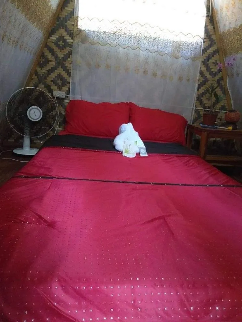 Bed in SHUKRAN Apartelle