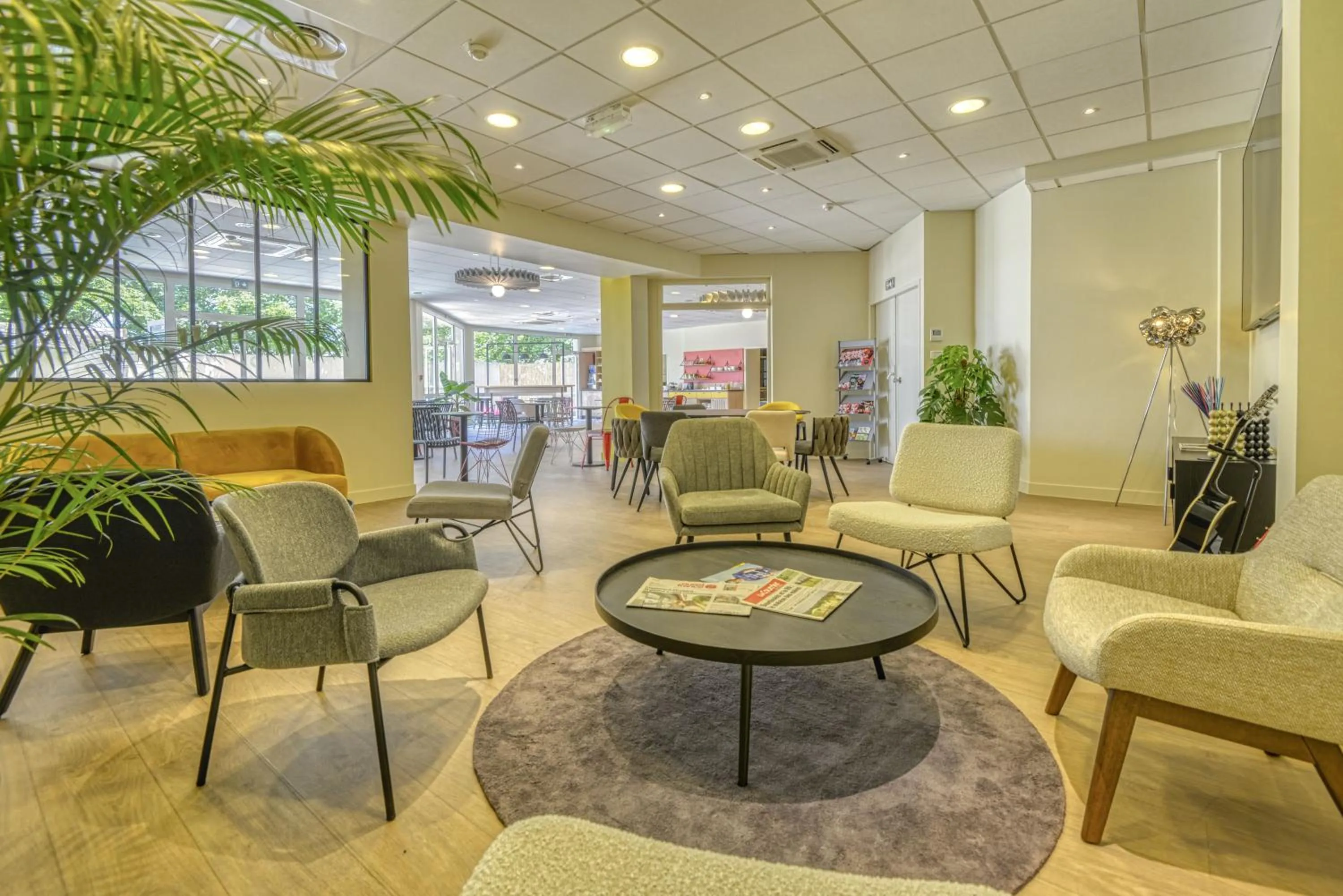 Communal lounge/ TV room in ibis Cholet