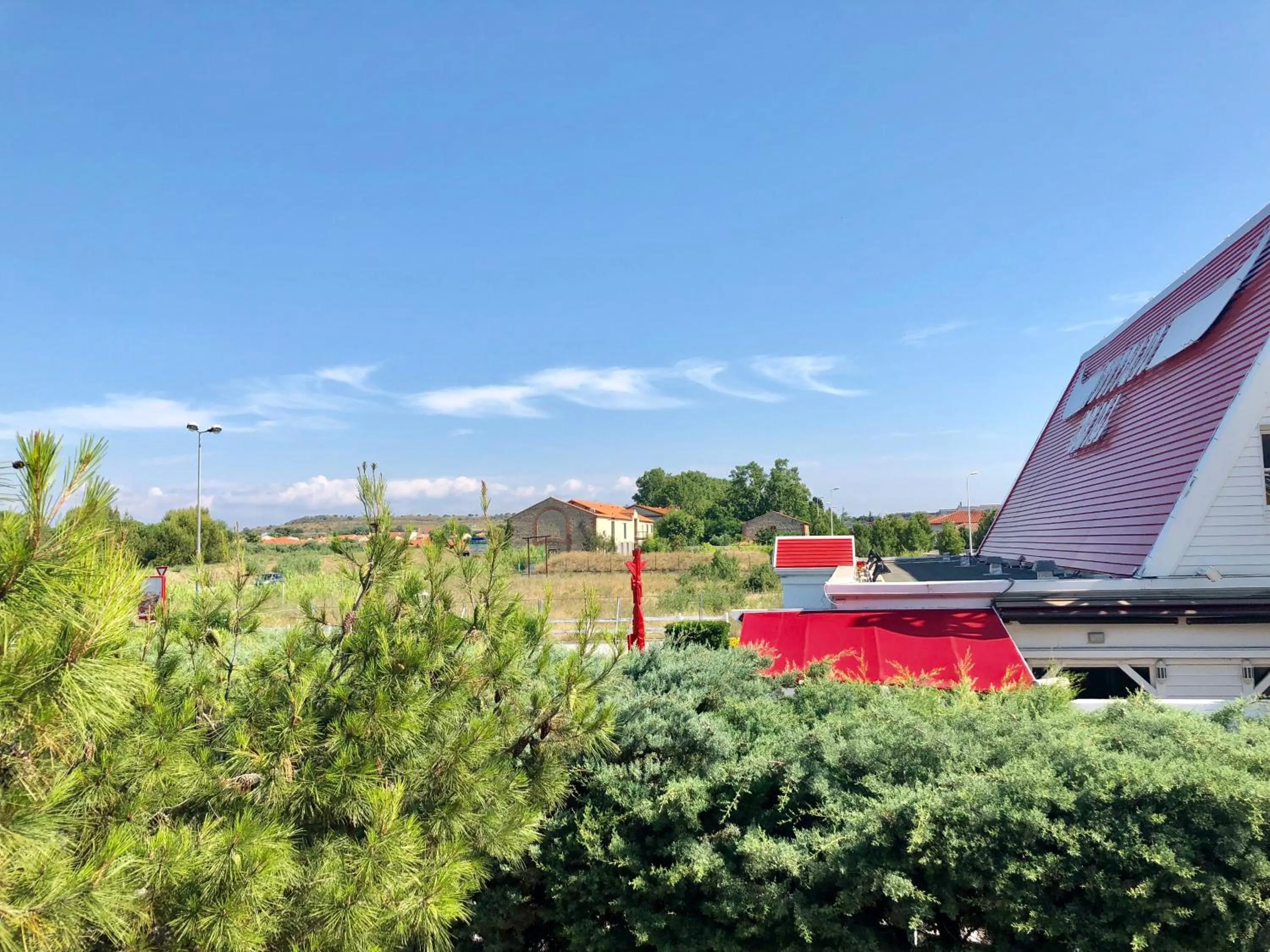 Garden view in Premiere Classe Perpignan Sud