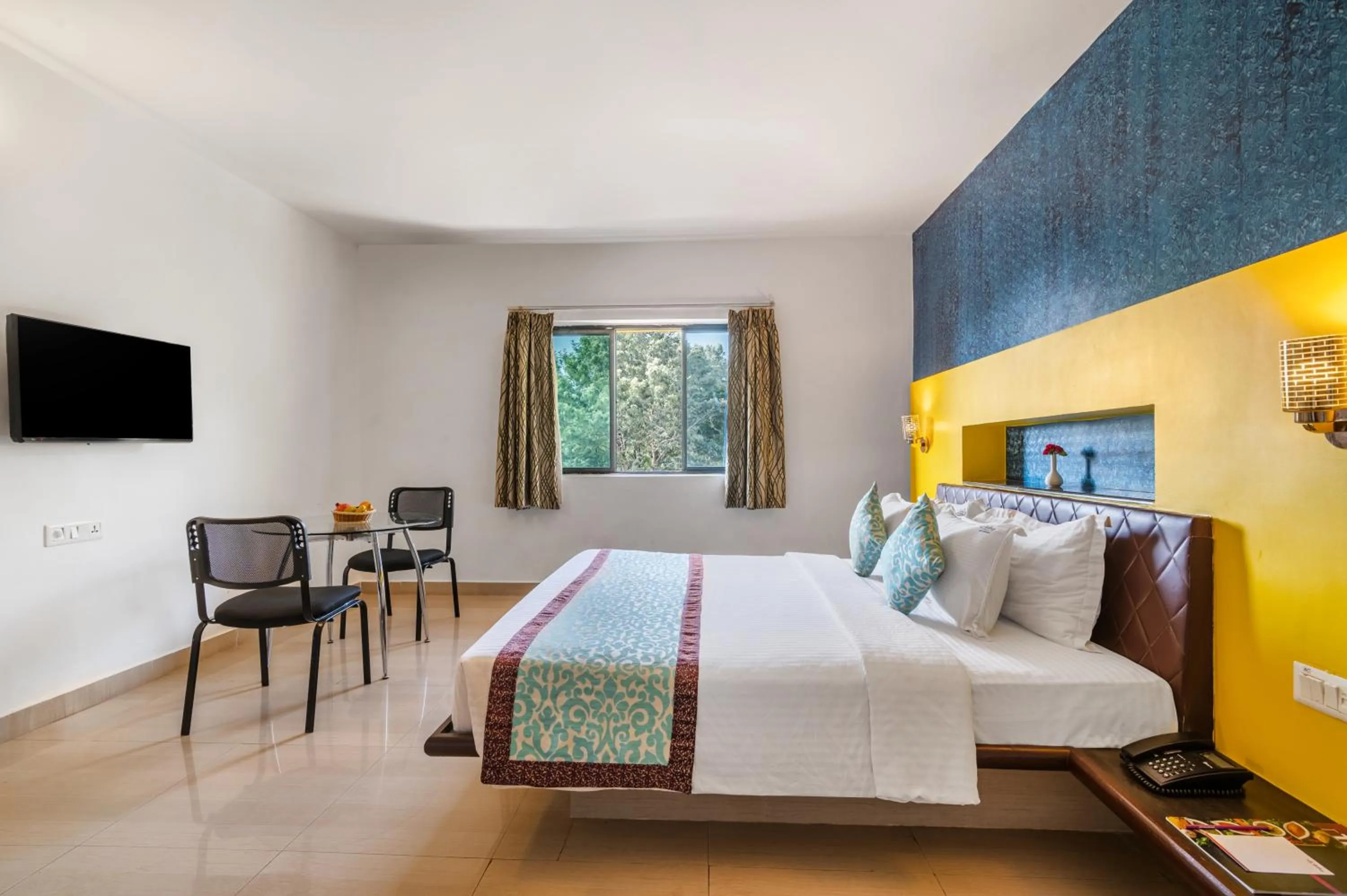 Photo of the whole room, Bed in Sterling Yelagiri