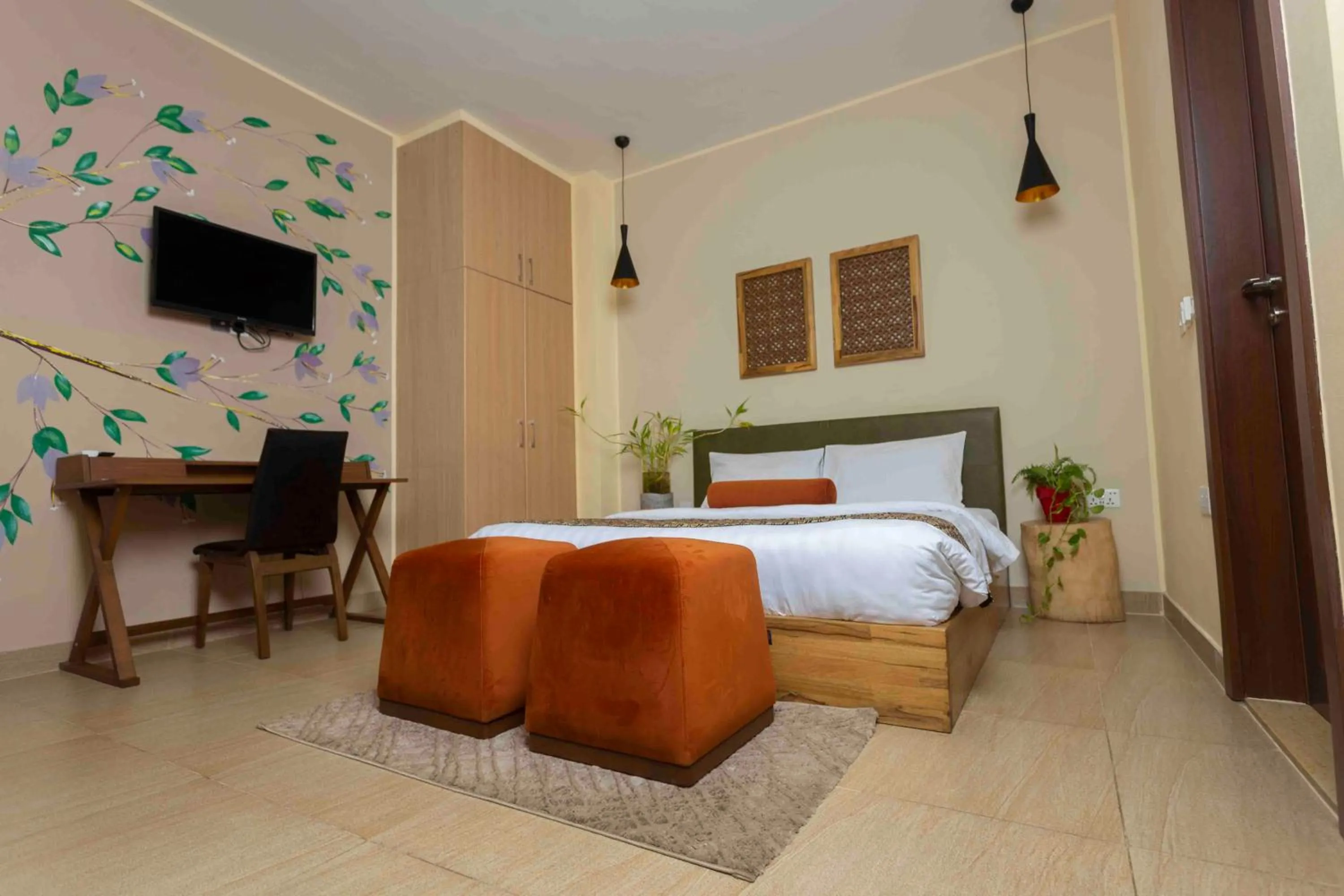 Bed in Roots Hotel Apartment