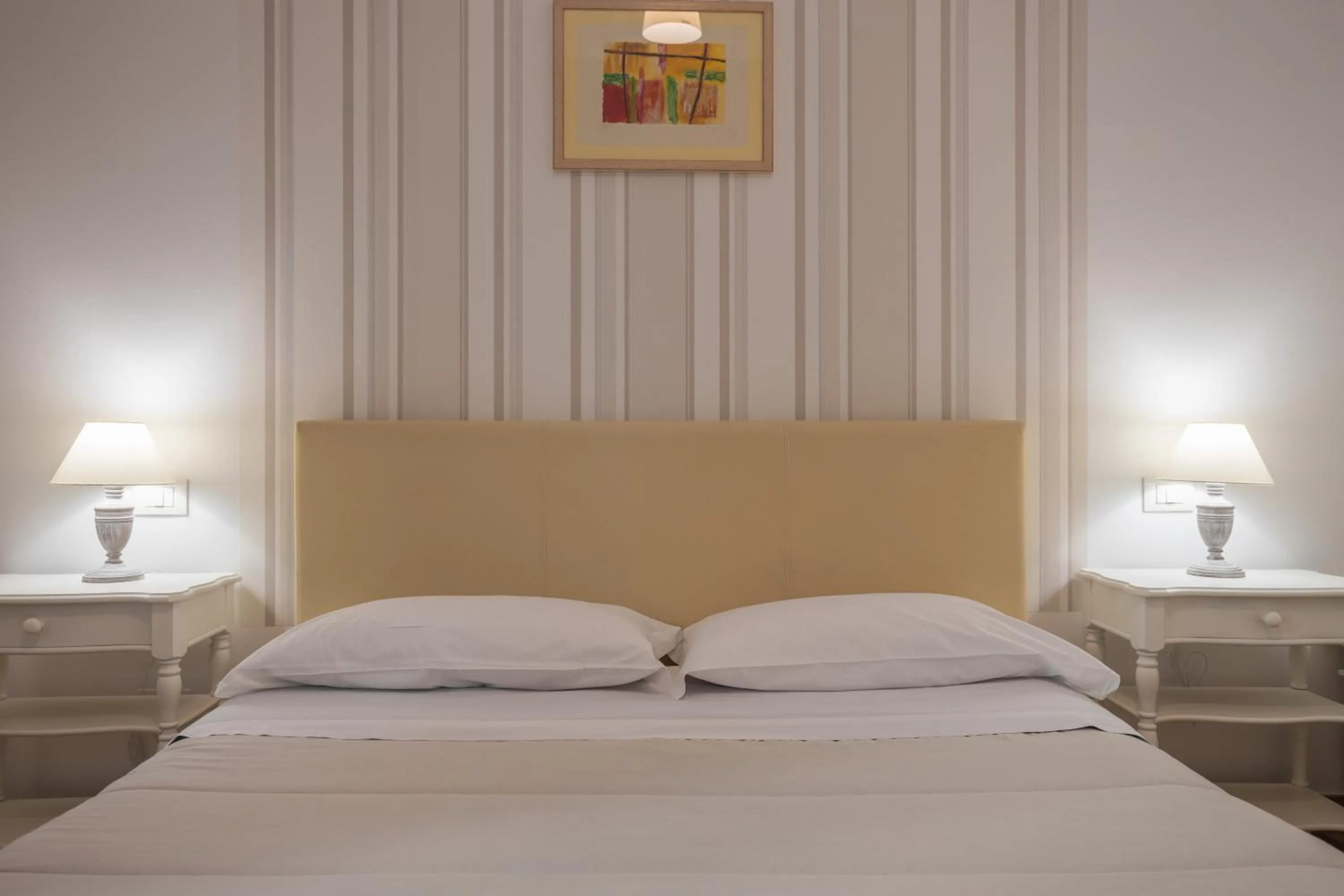 Bed in B&B Palermo Bella Rooms and Suites