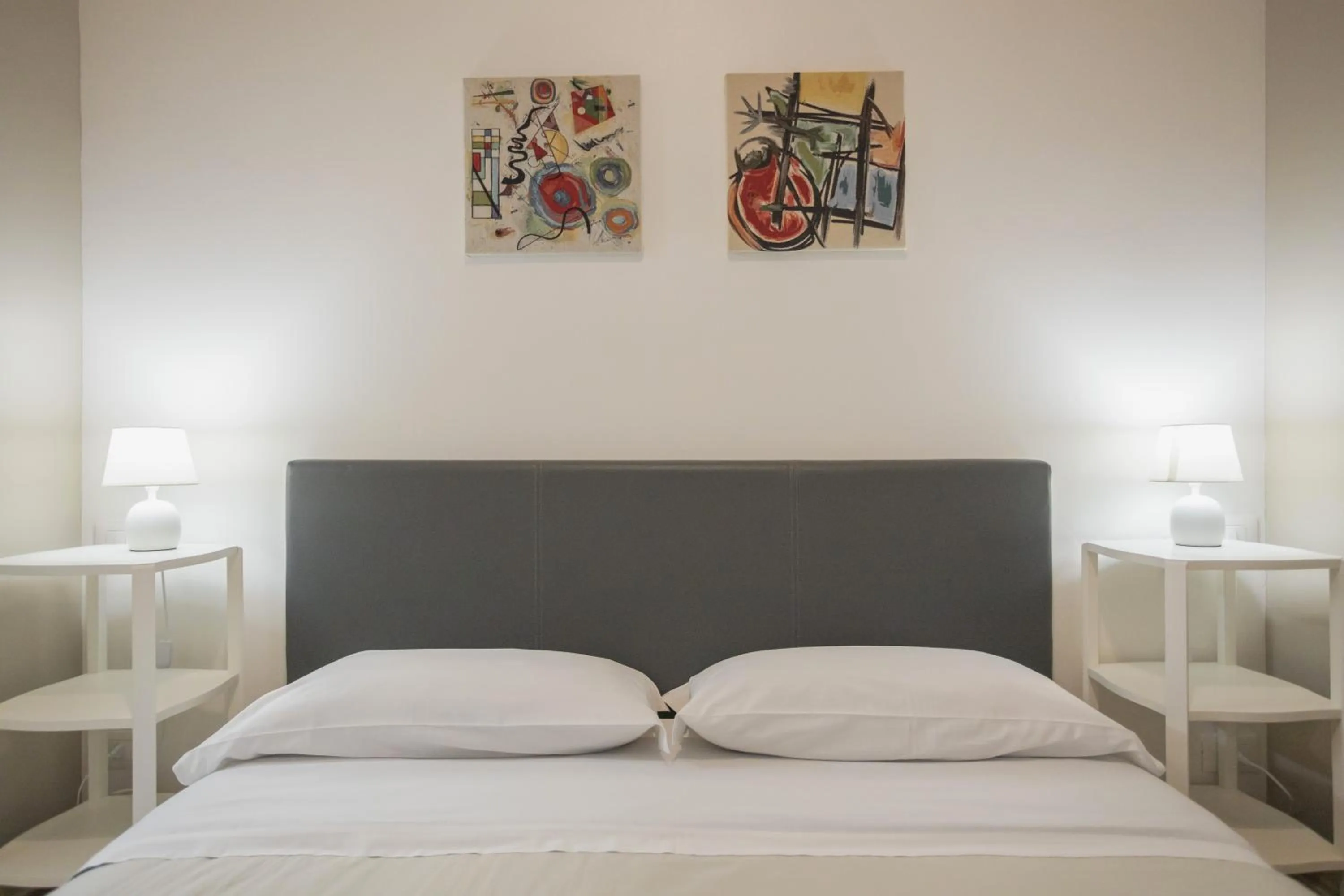 Bed in B&B Palermo Bella Rooms and Suites