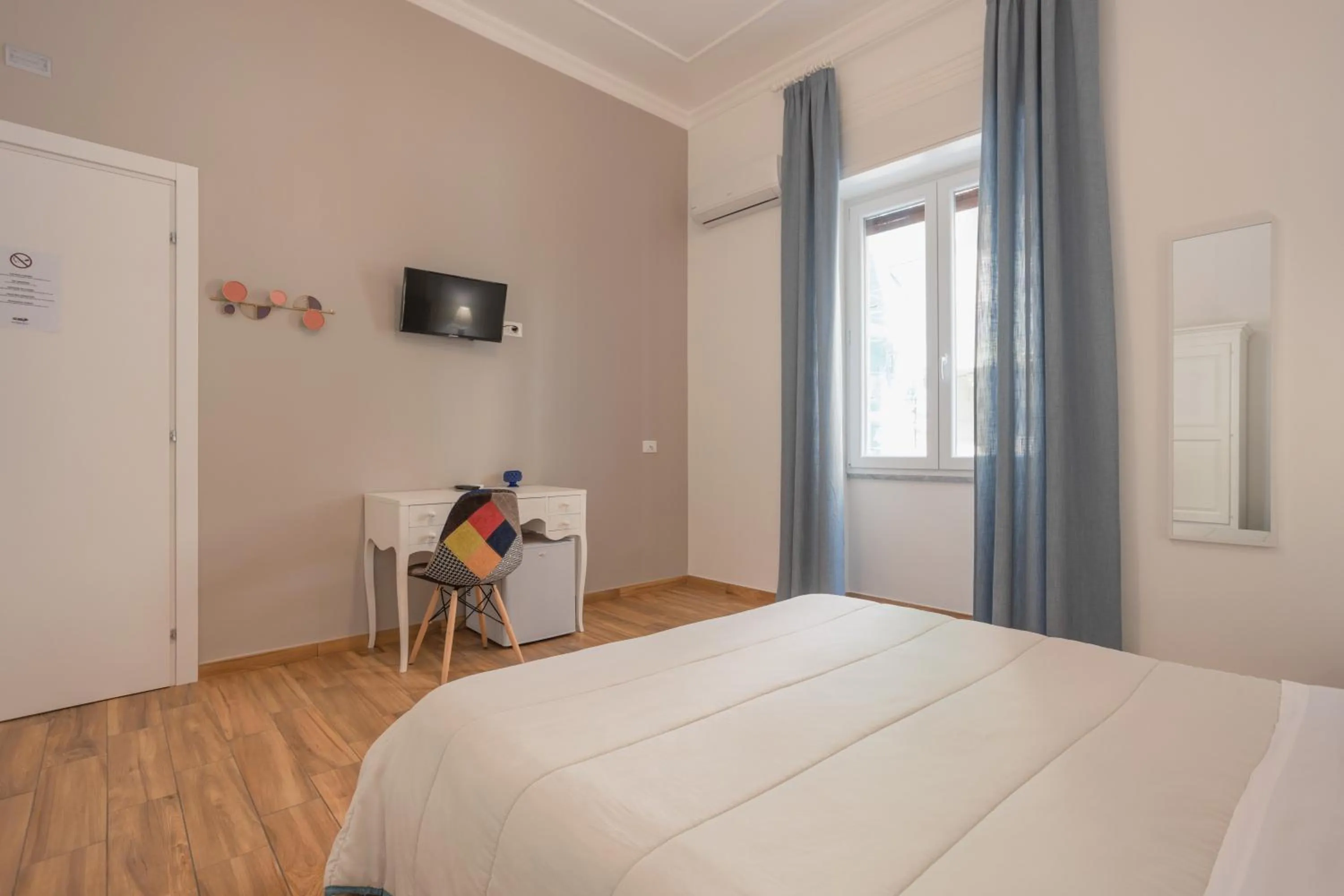 Bed in B&B Palermo Bella Rooms and Suites