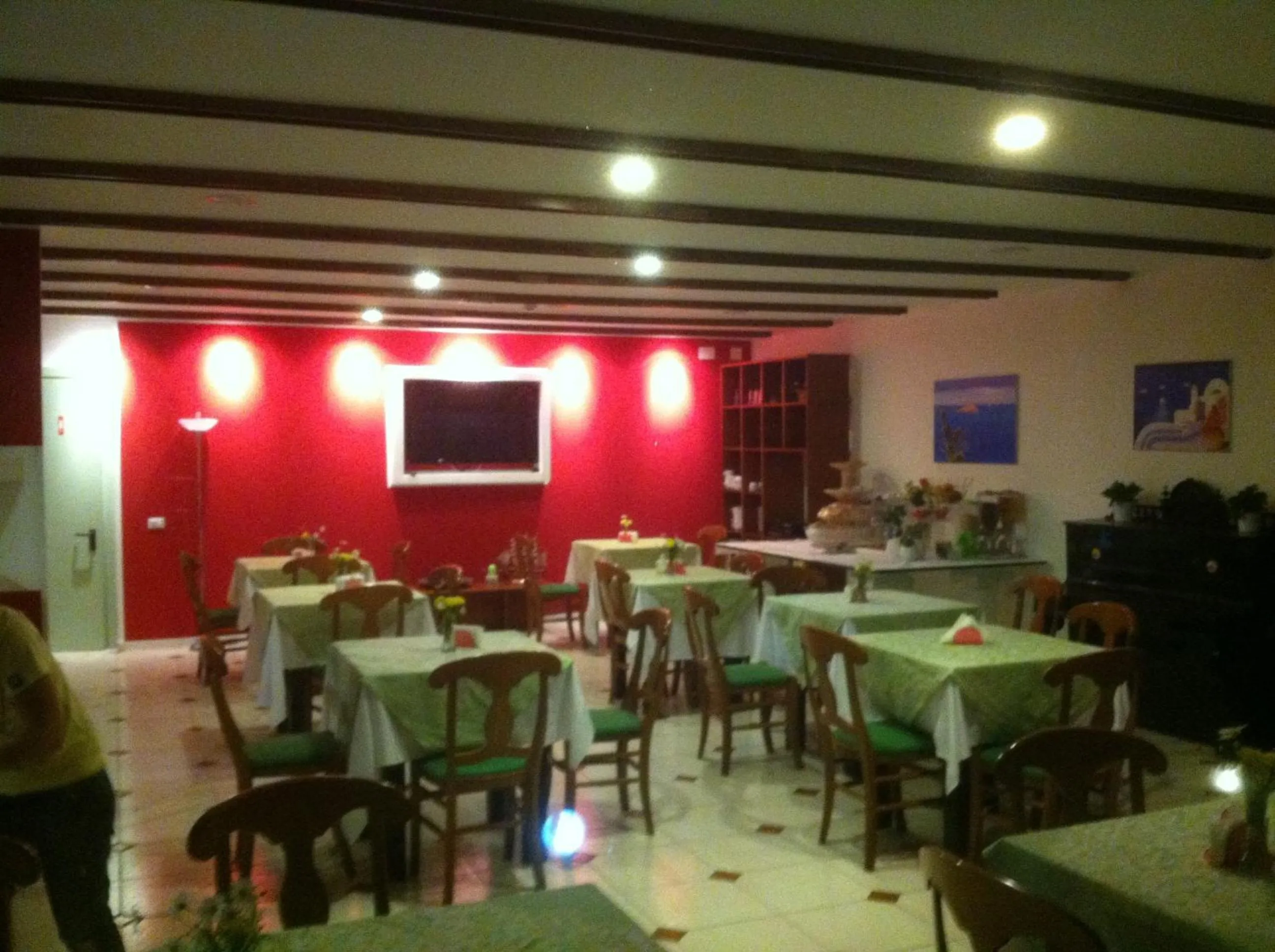 Communal lounge/ TV room in Bellevue del Golfo Hotel & Spa