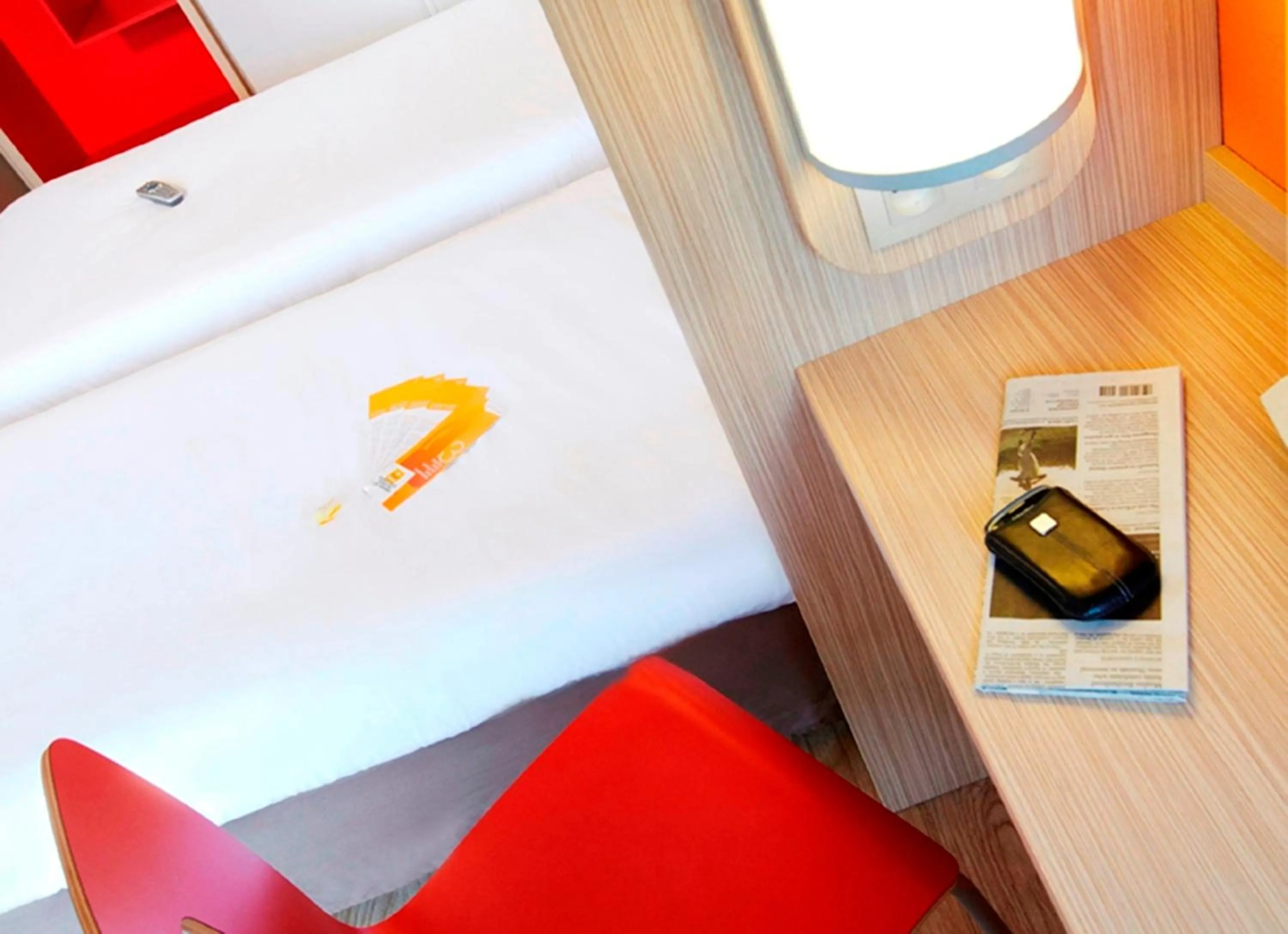 Seating area in Premiere Classe Valenciennes Ouest Petite Foret