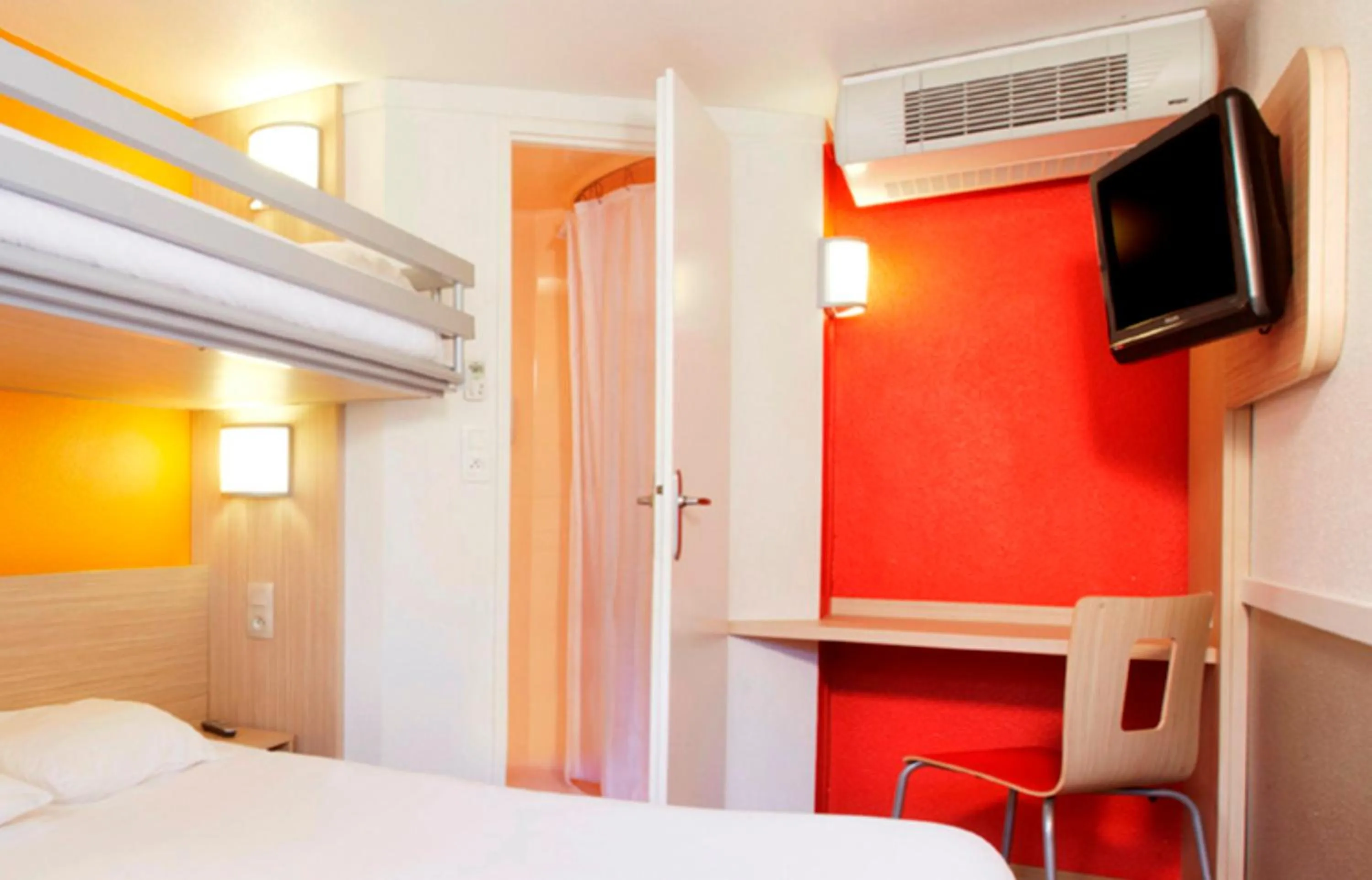 Bedroom, Bed in Premiere Classe Valenciennes Ouest Petite Foret