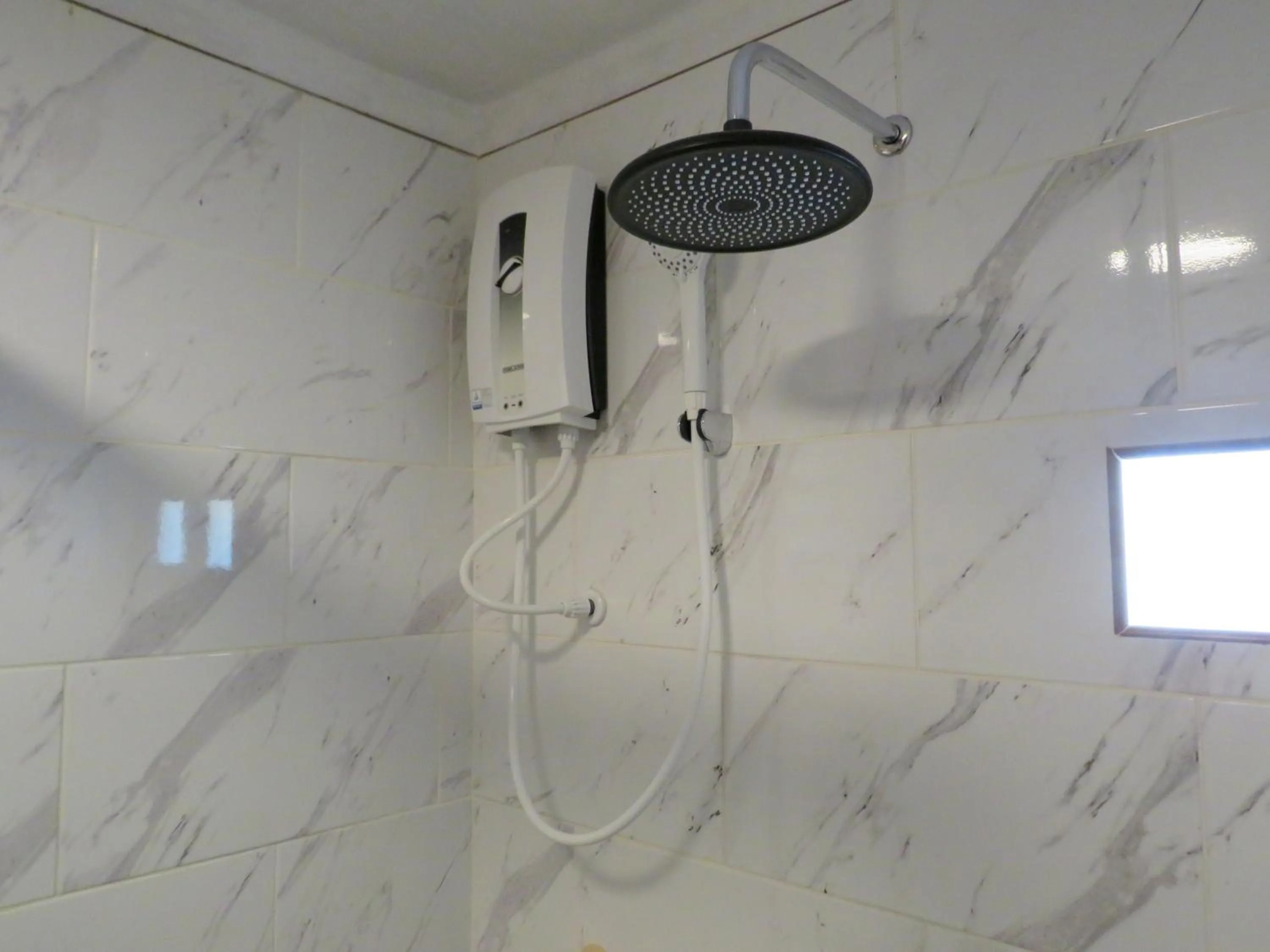 Shower in ALONALAND RESORT