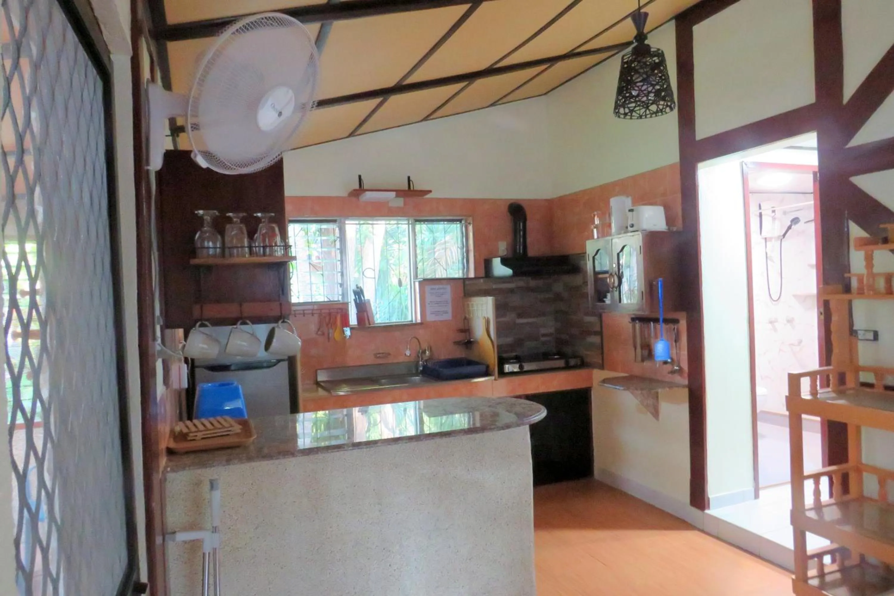 Kitchen or kitchenette in ALONALAND RESORT