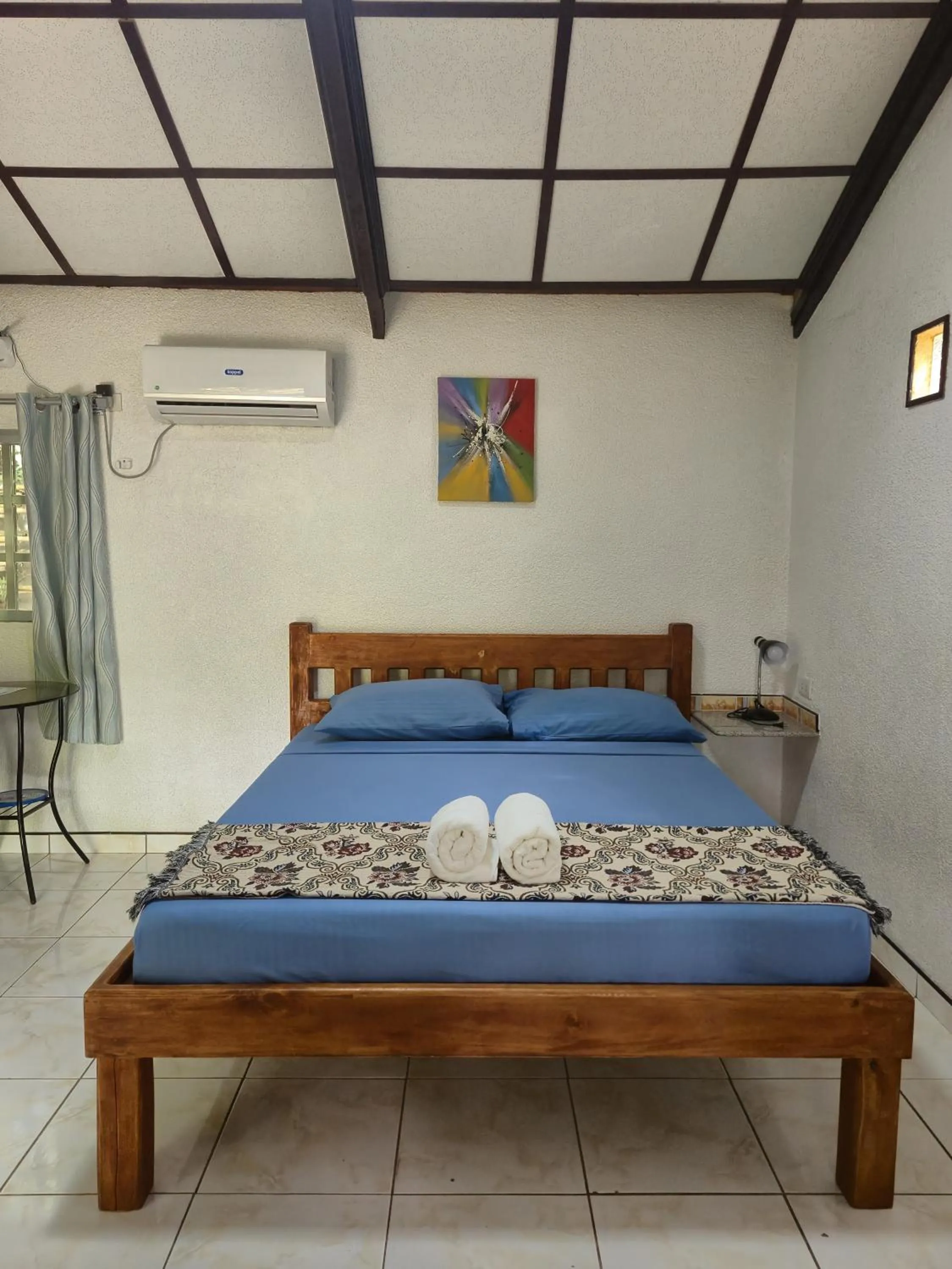 Bed in ALONALAND RESORT