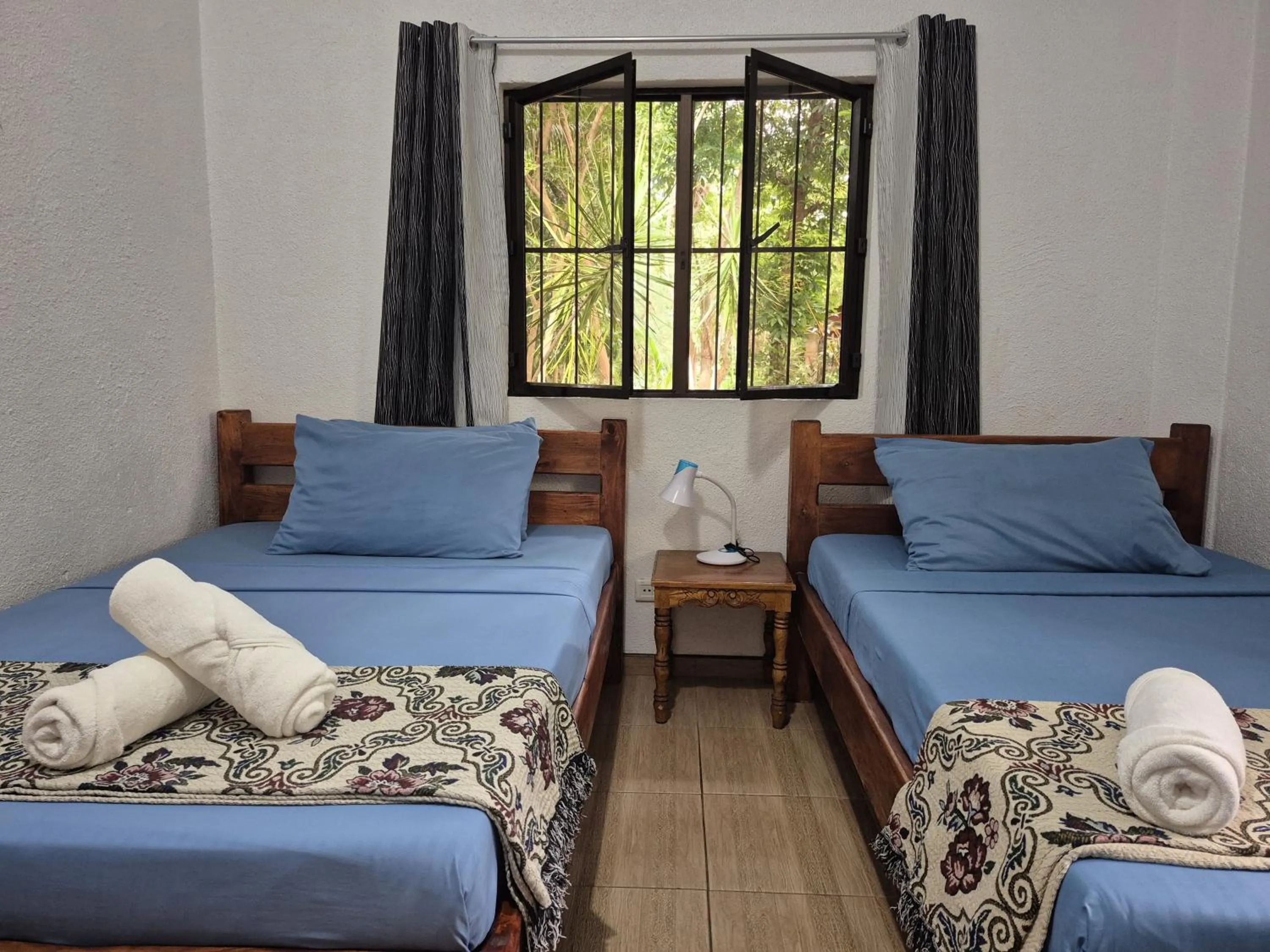 Bed in ALONALAND RESORT