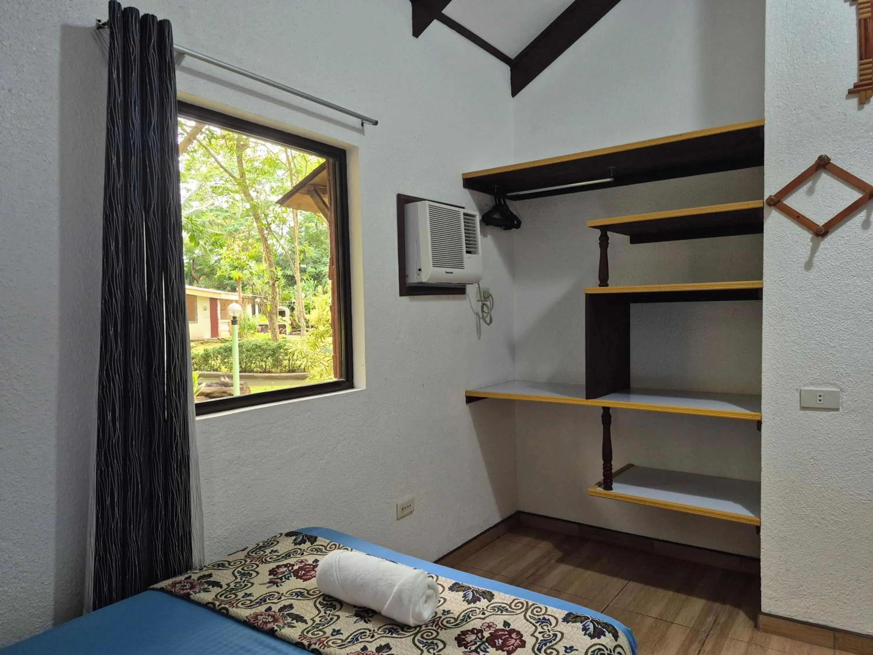 Bed in ALONALAND RESORT