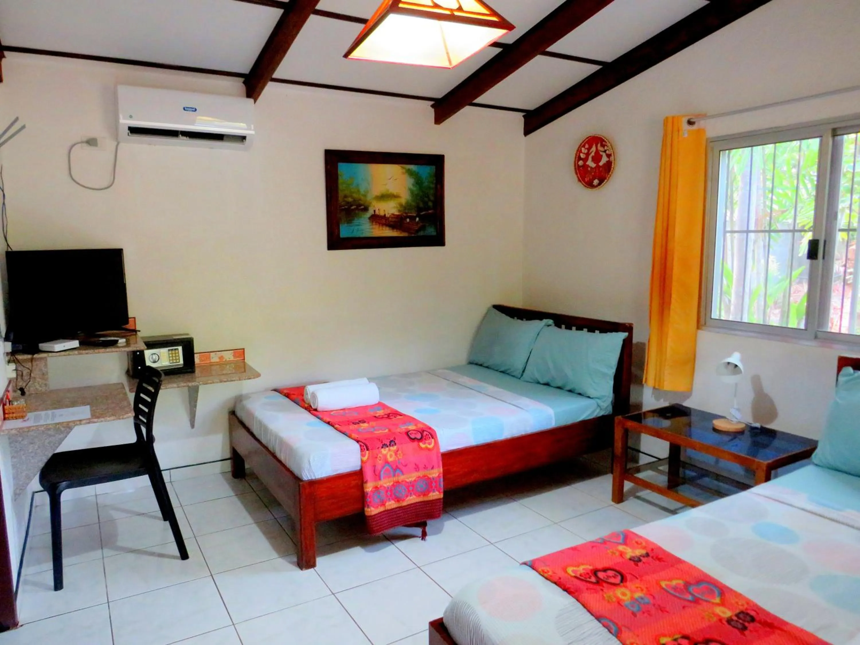 Bed in ALONALAND RESORT