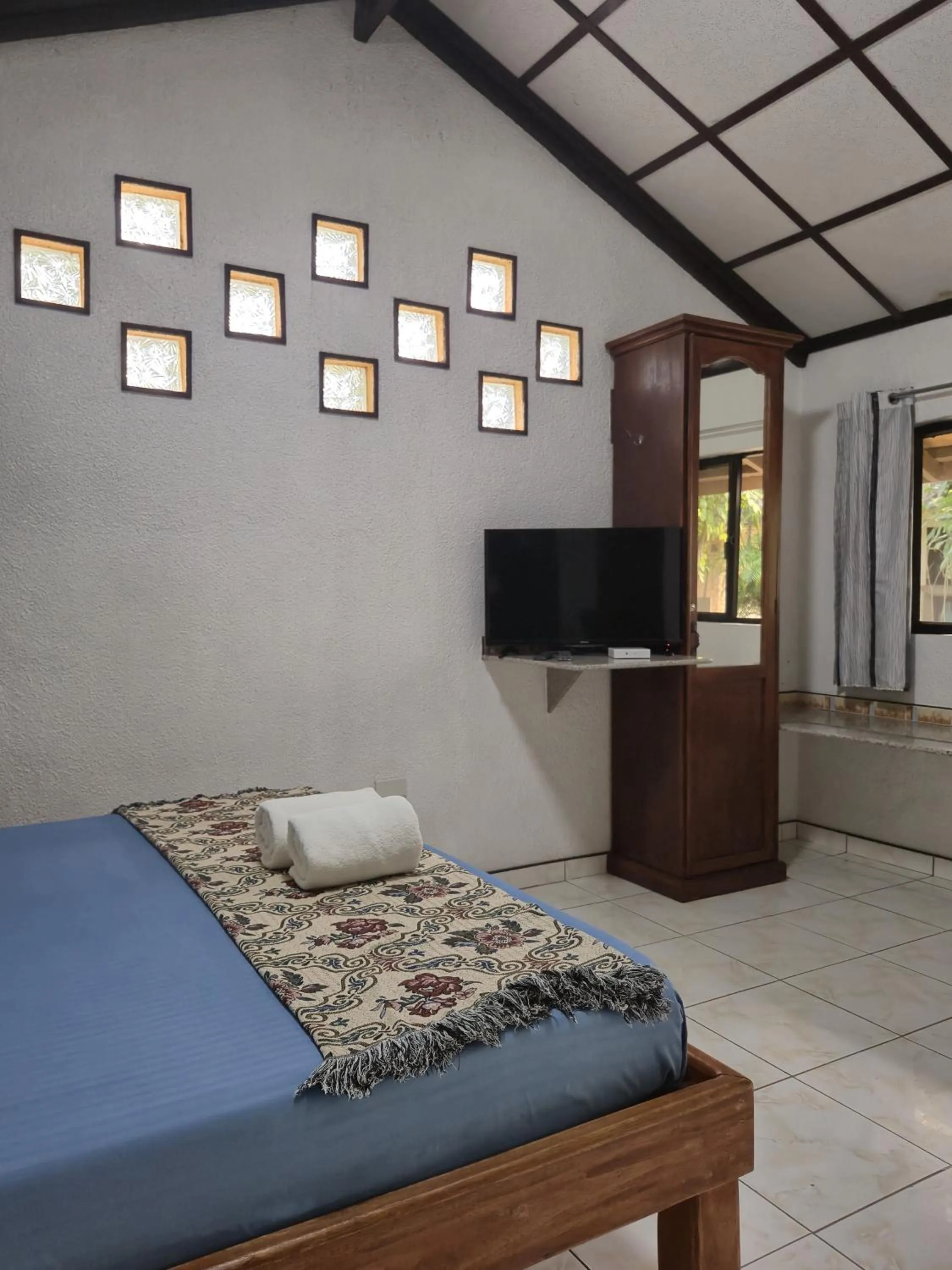 Bed in ALONALAND RESORT