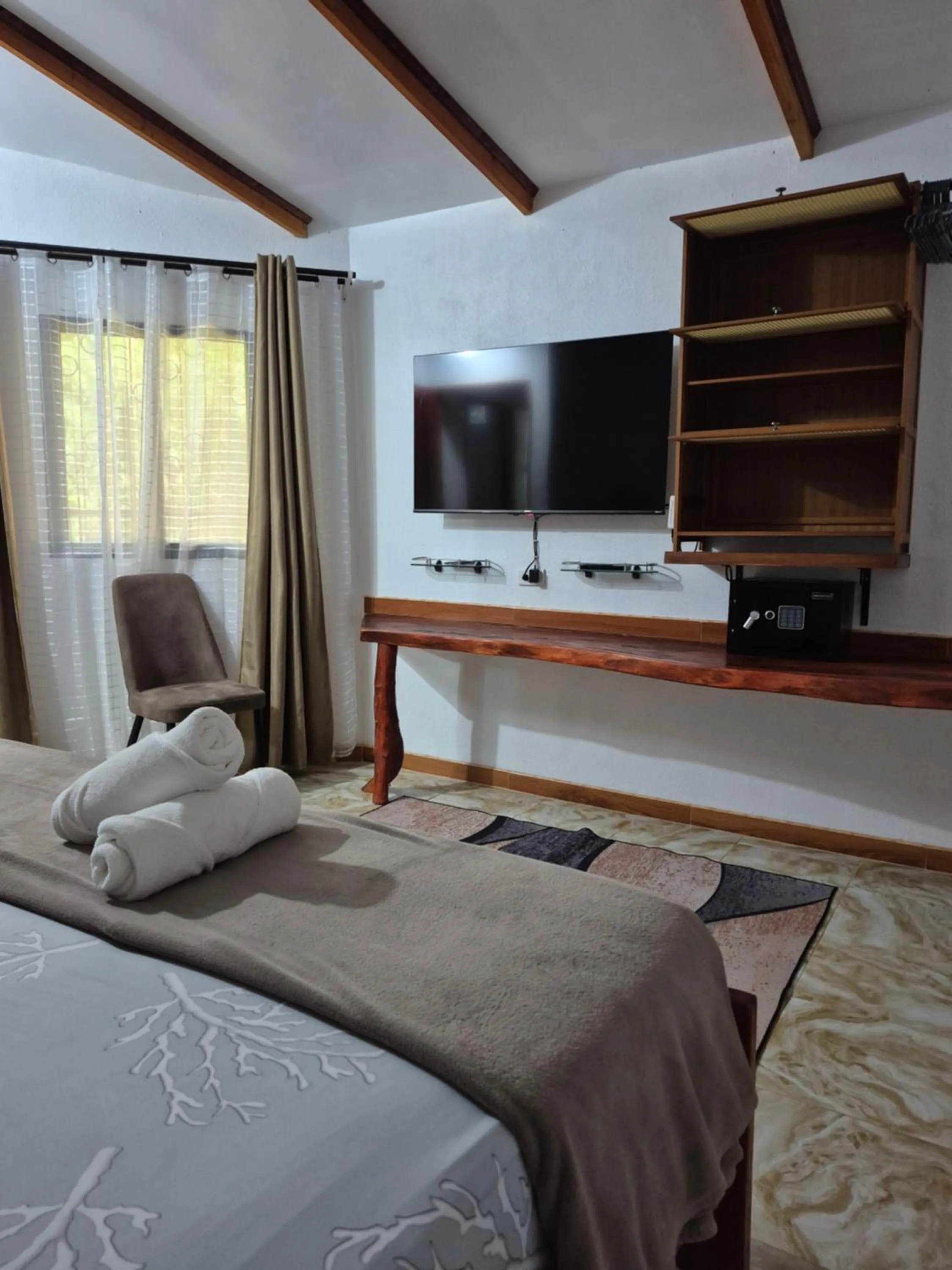 Bed in ALONALAND RESORT