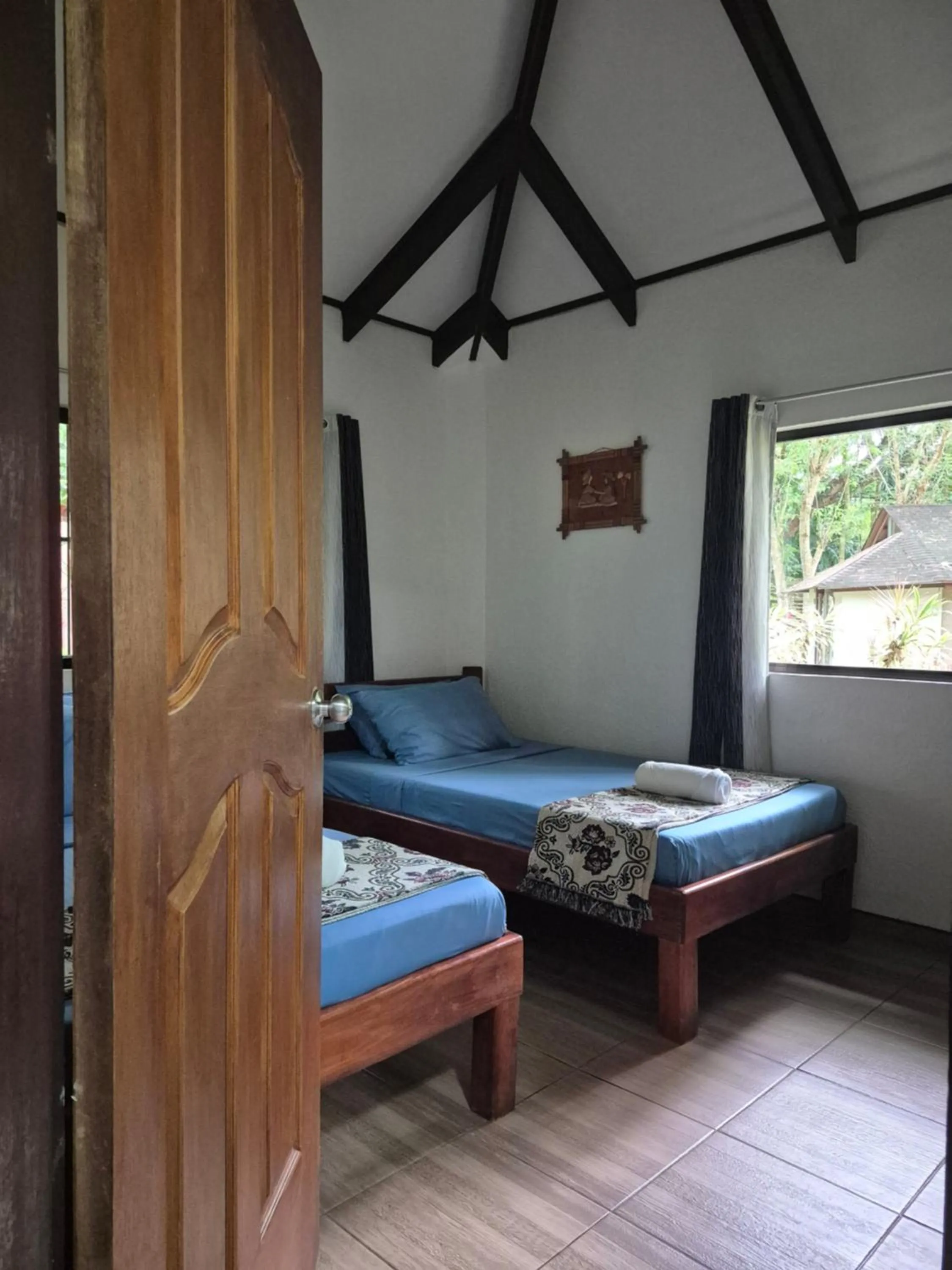 Bed in ALONALAND RESORT