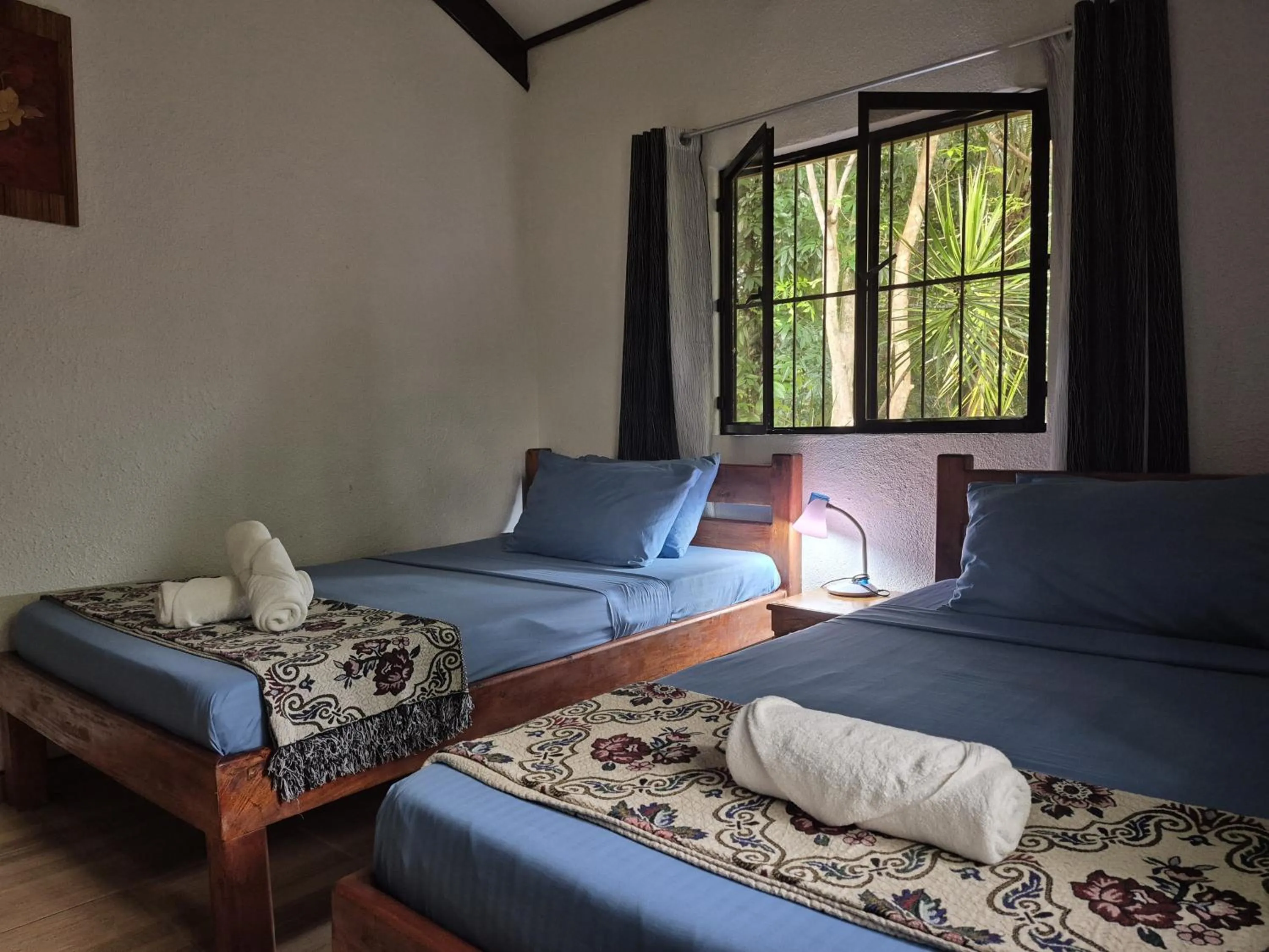 Bed in ALONALAND RESORT