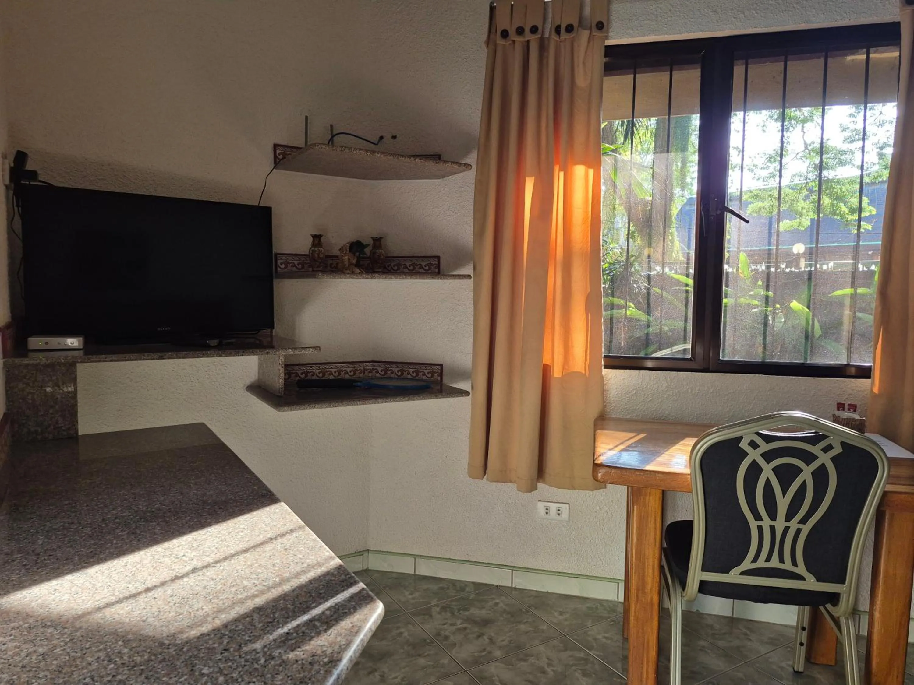 Bed in ALONALAND RESORT