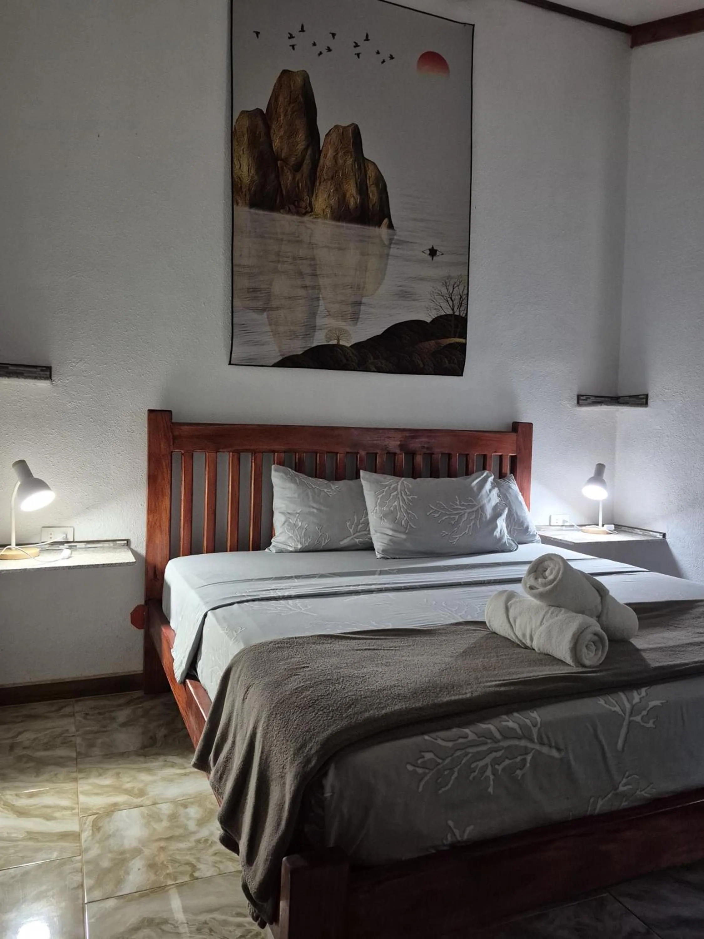 Bed in ALONALAND RESORT