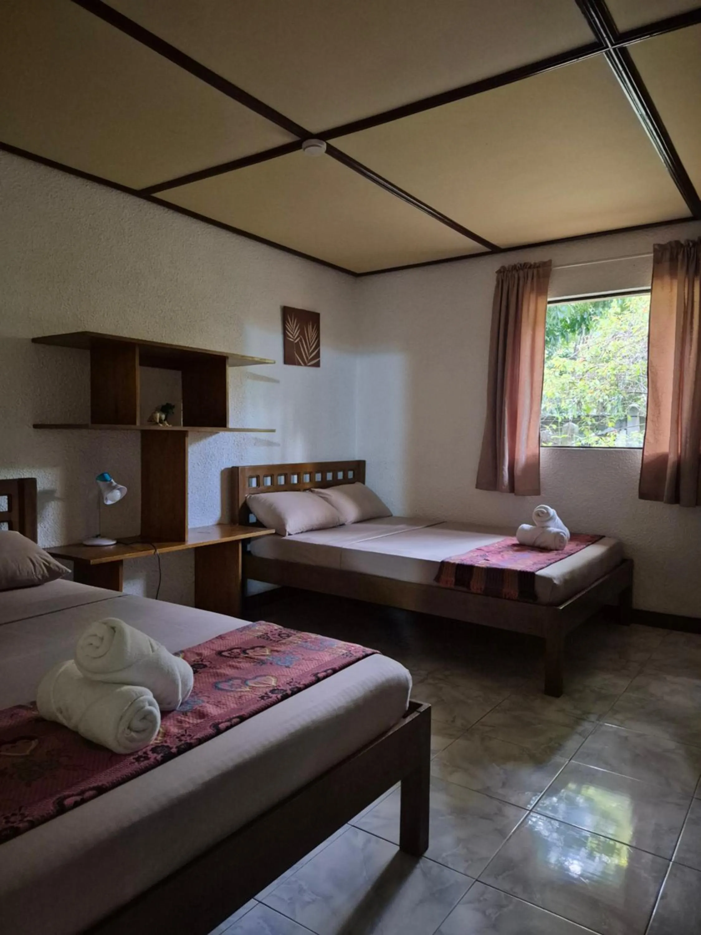 Bed in ALONALAND RESORT