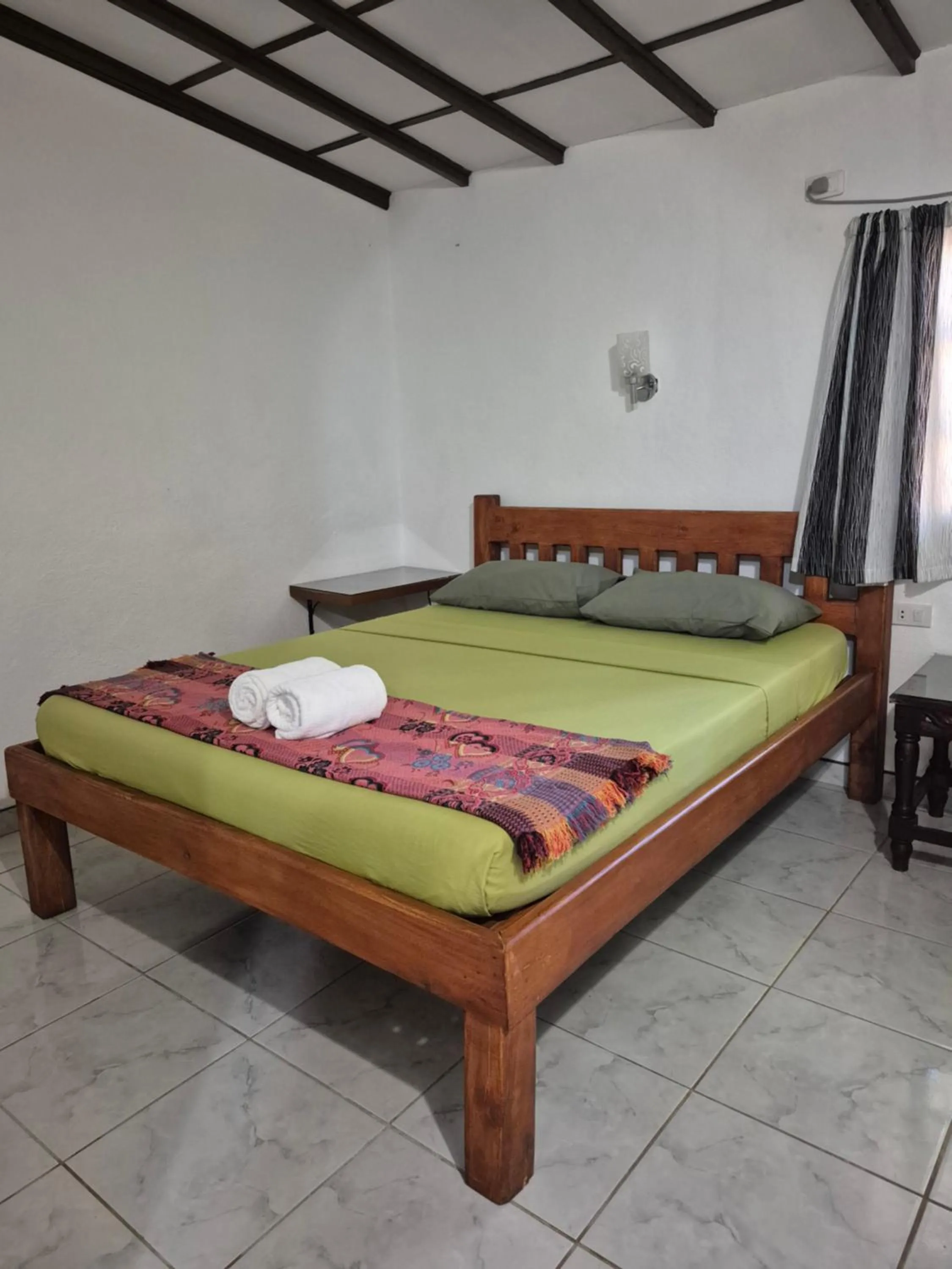 Bed in ALONALAND RESORT