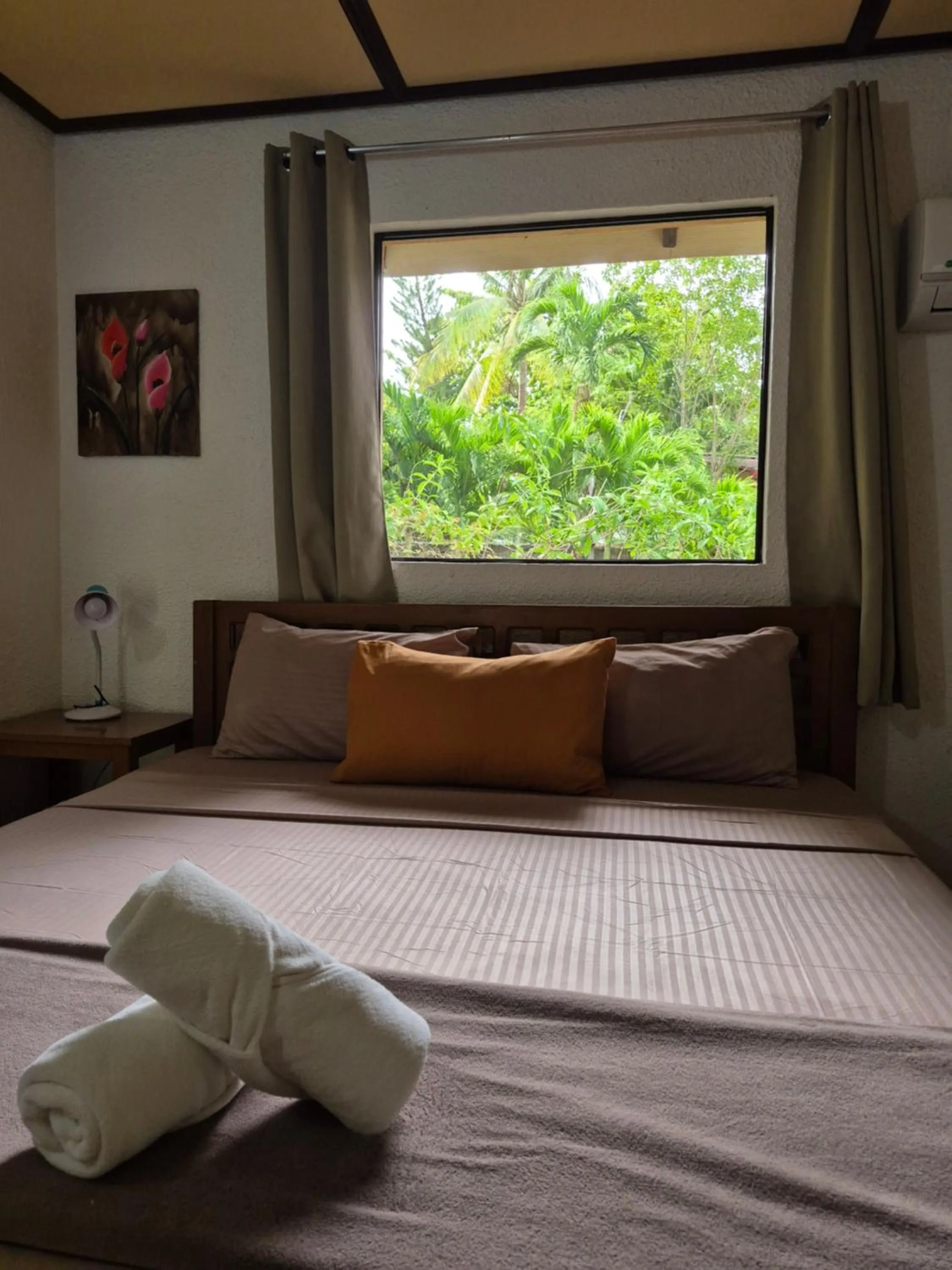 Bed in ALONALAND RESORT