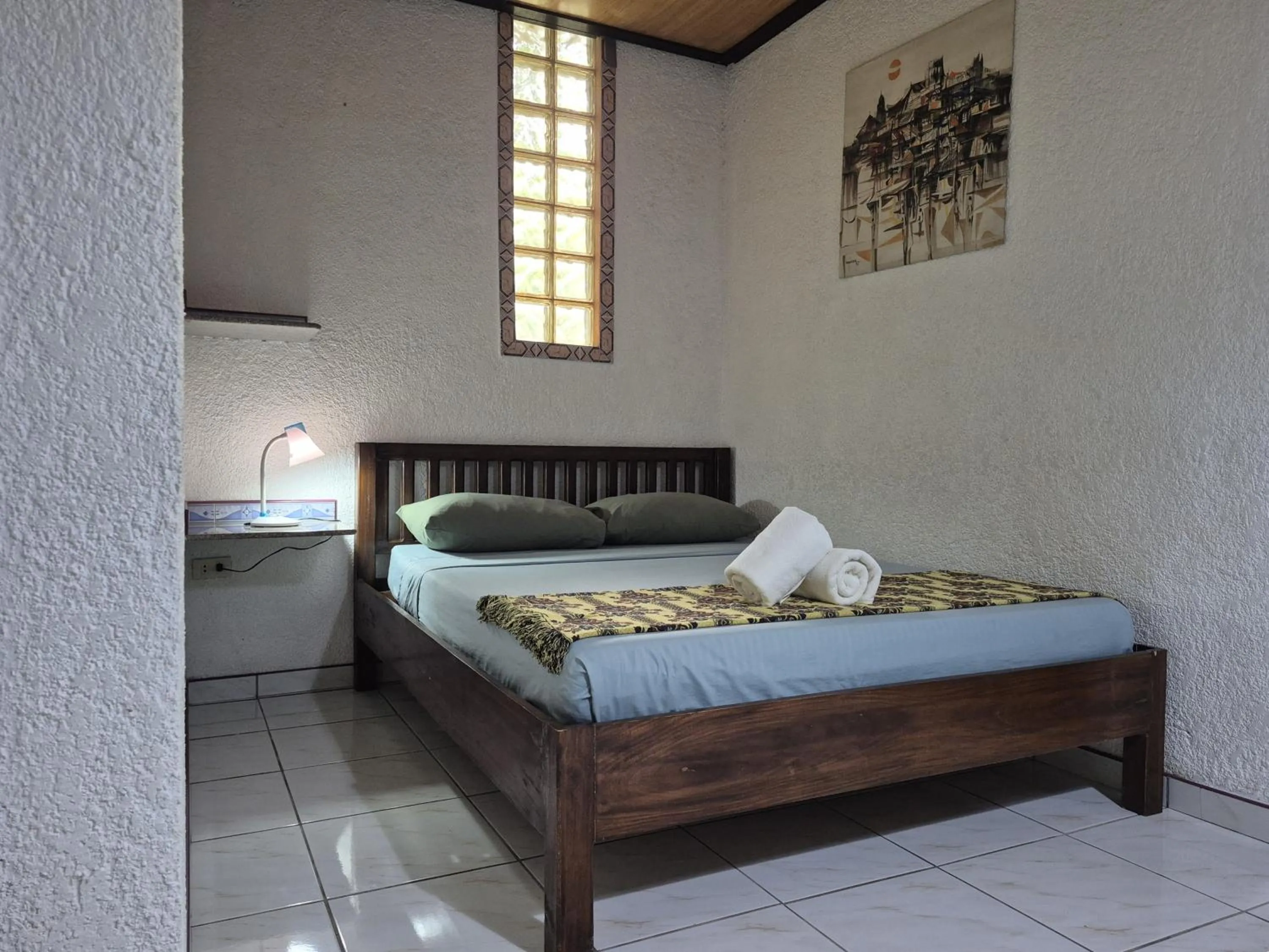 Bed in ALONALAND RESORT