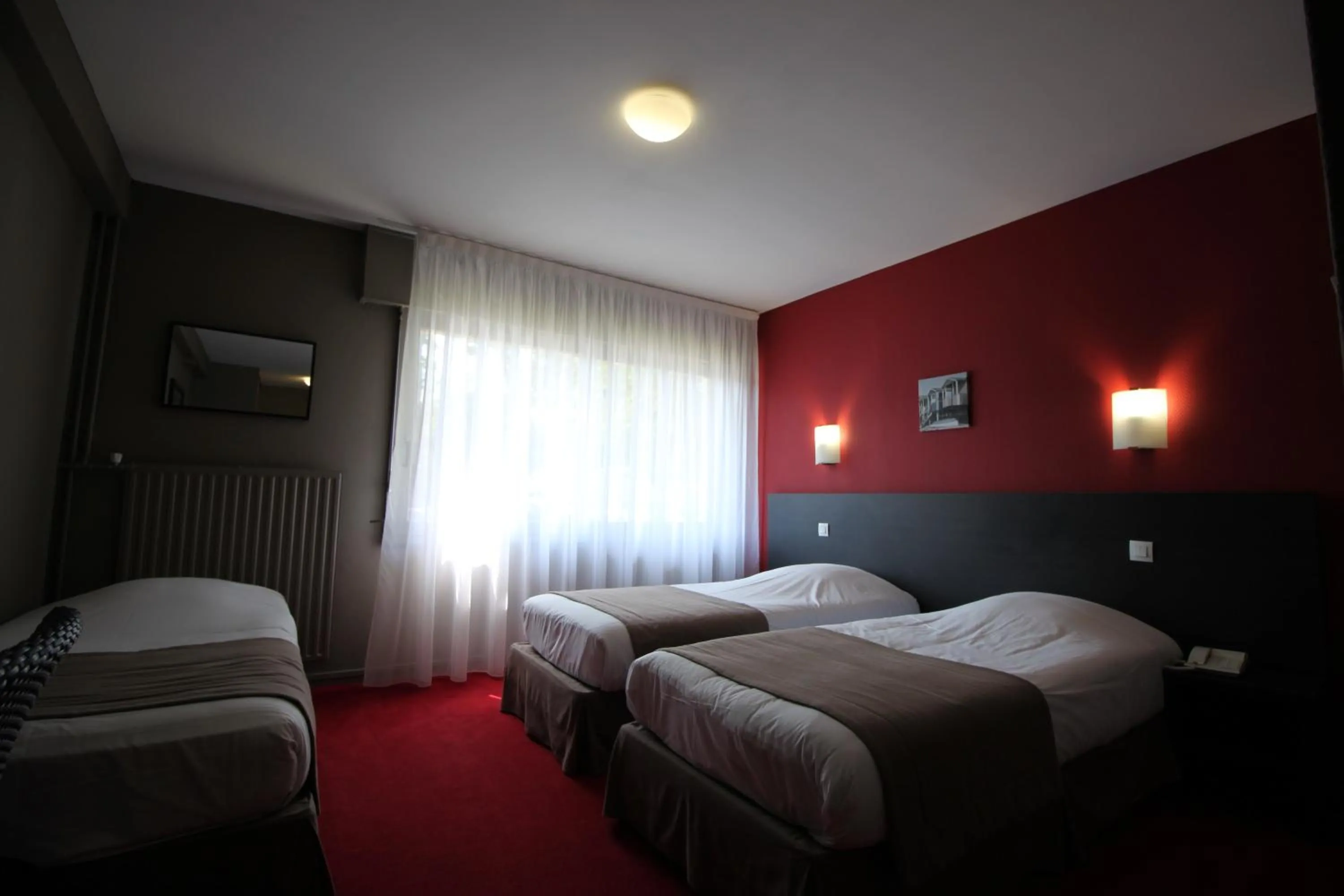 Bed in Le Regina Hôtel restaurant