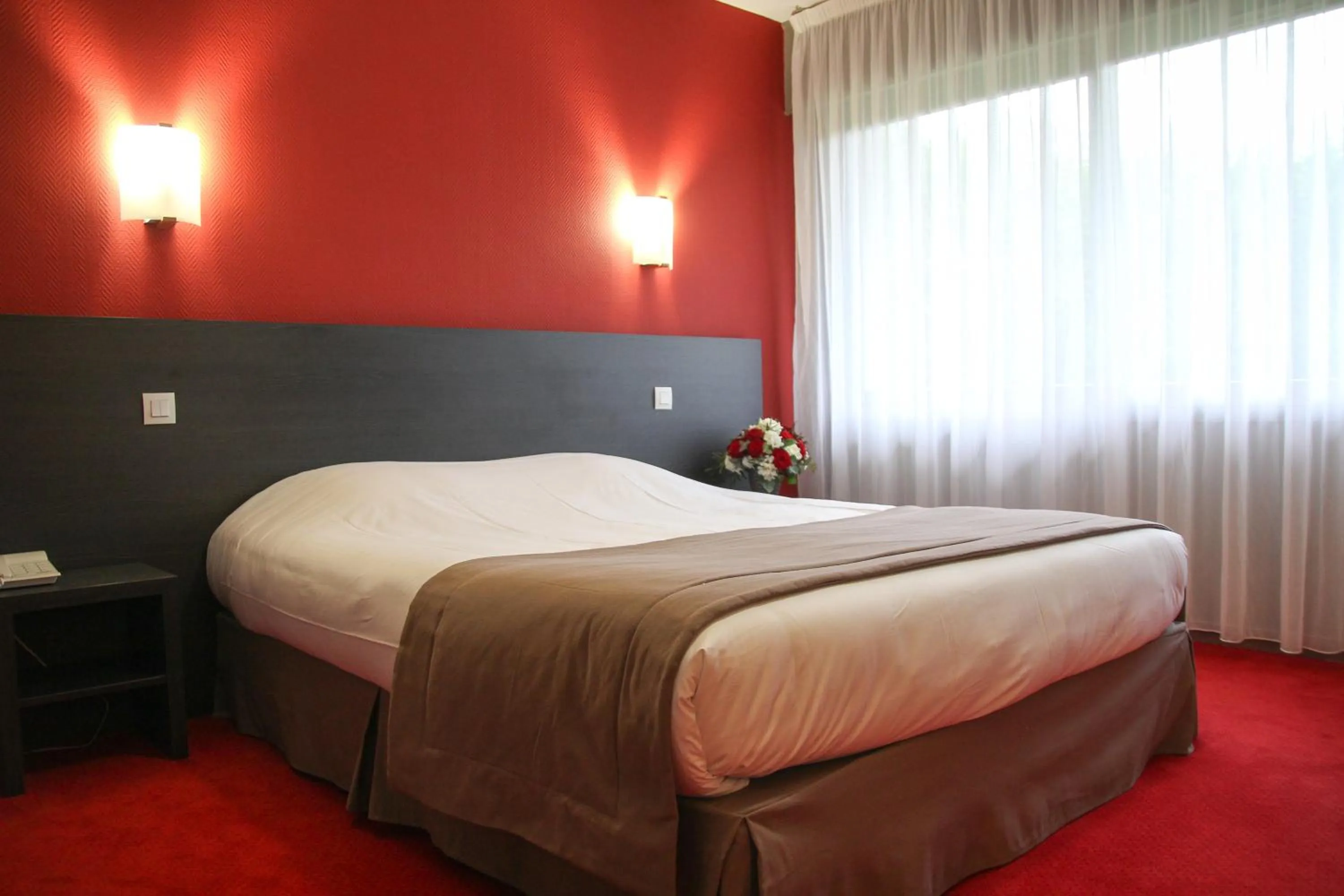 Bed in Le Regina Hôtel restaurant