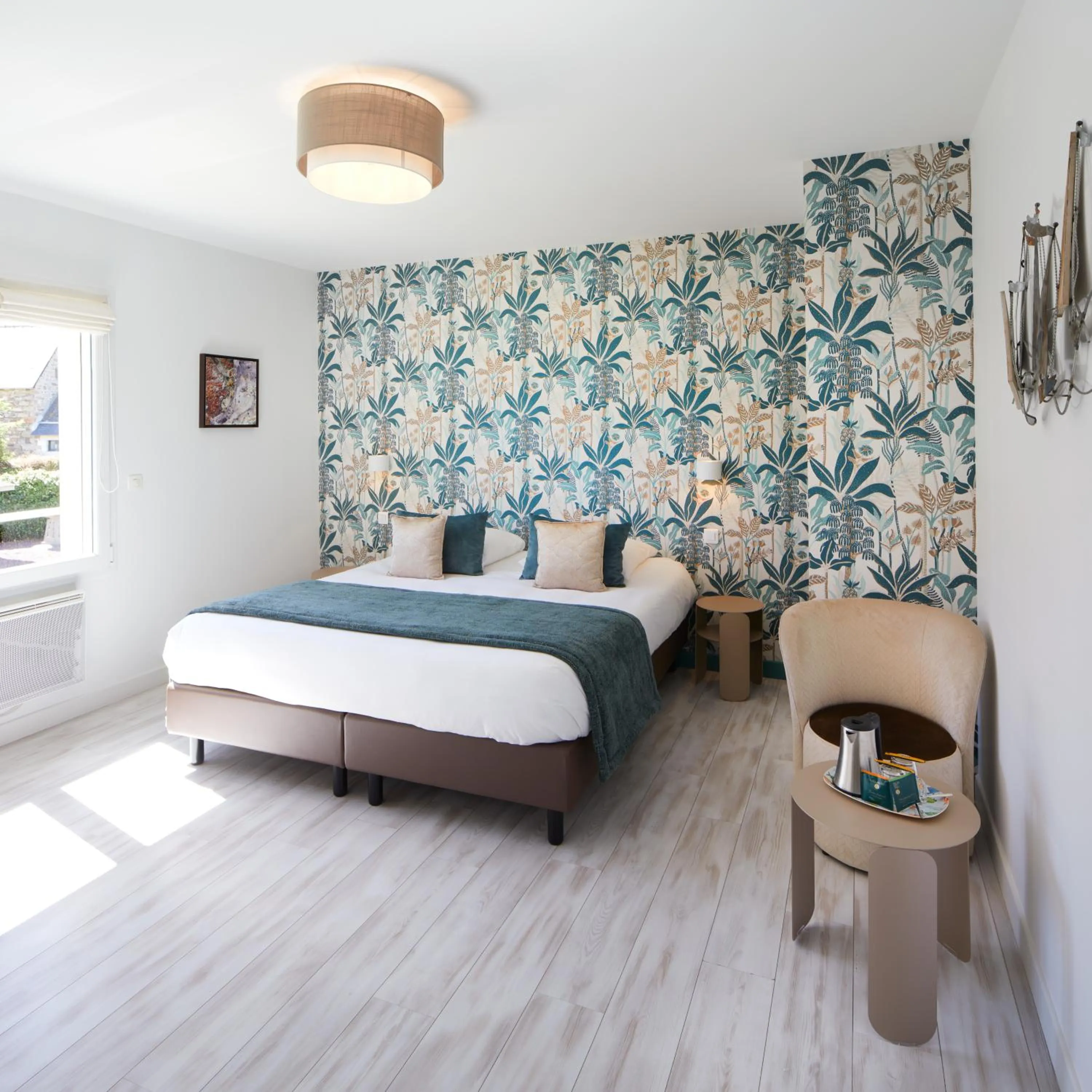 Bed in Hôtel Les Agapanthes-Logis Hôtel