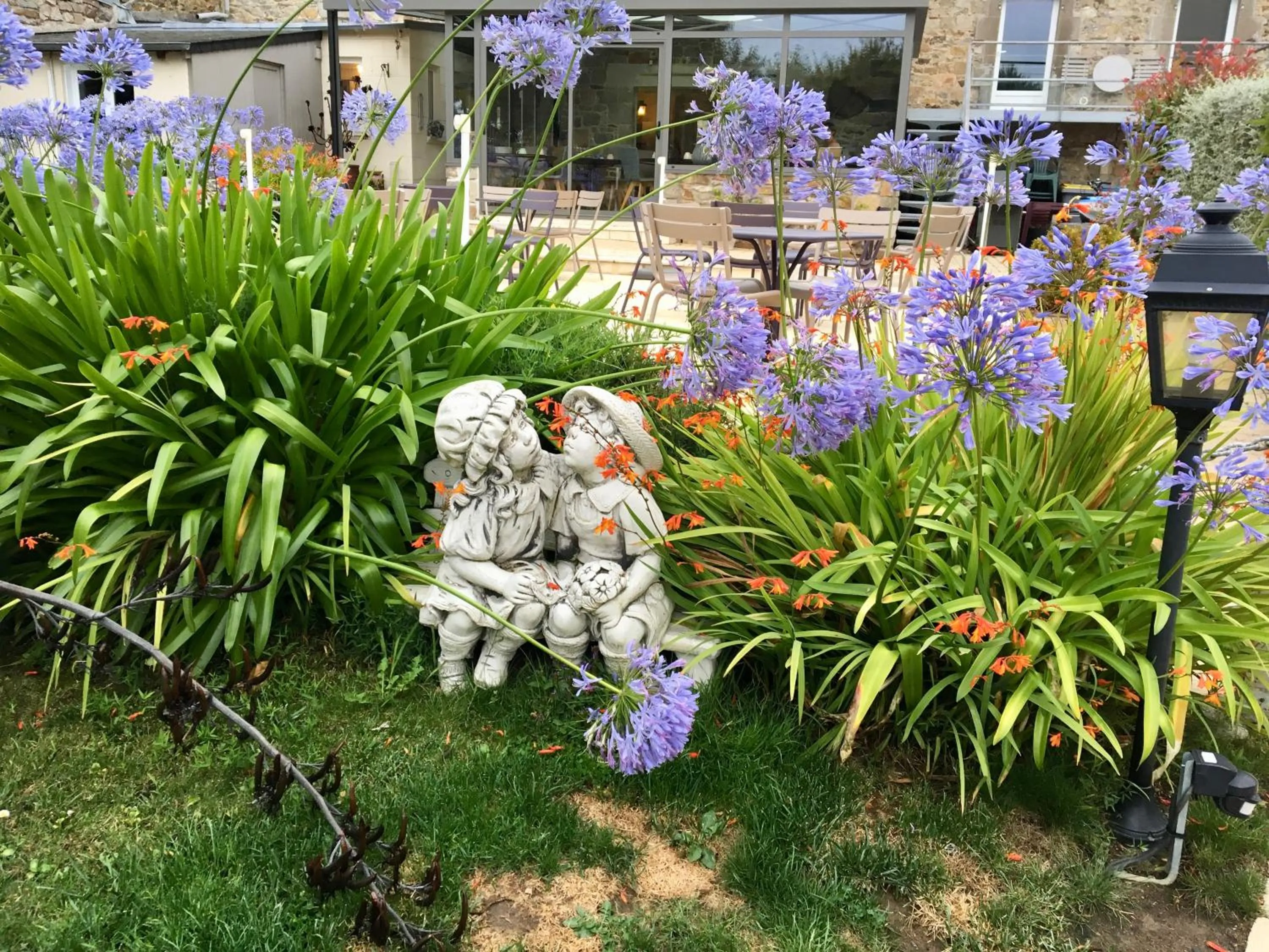 Garden in Hôtel Les Agapanthes-Logis Hôtel