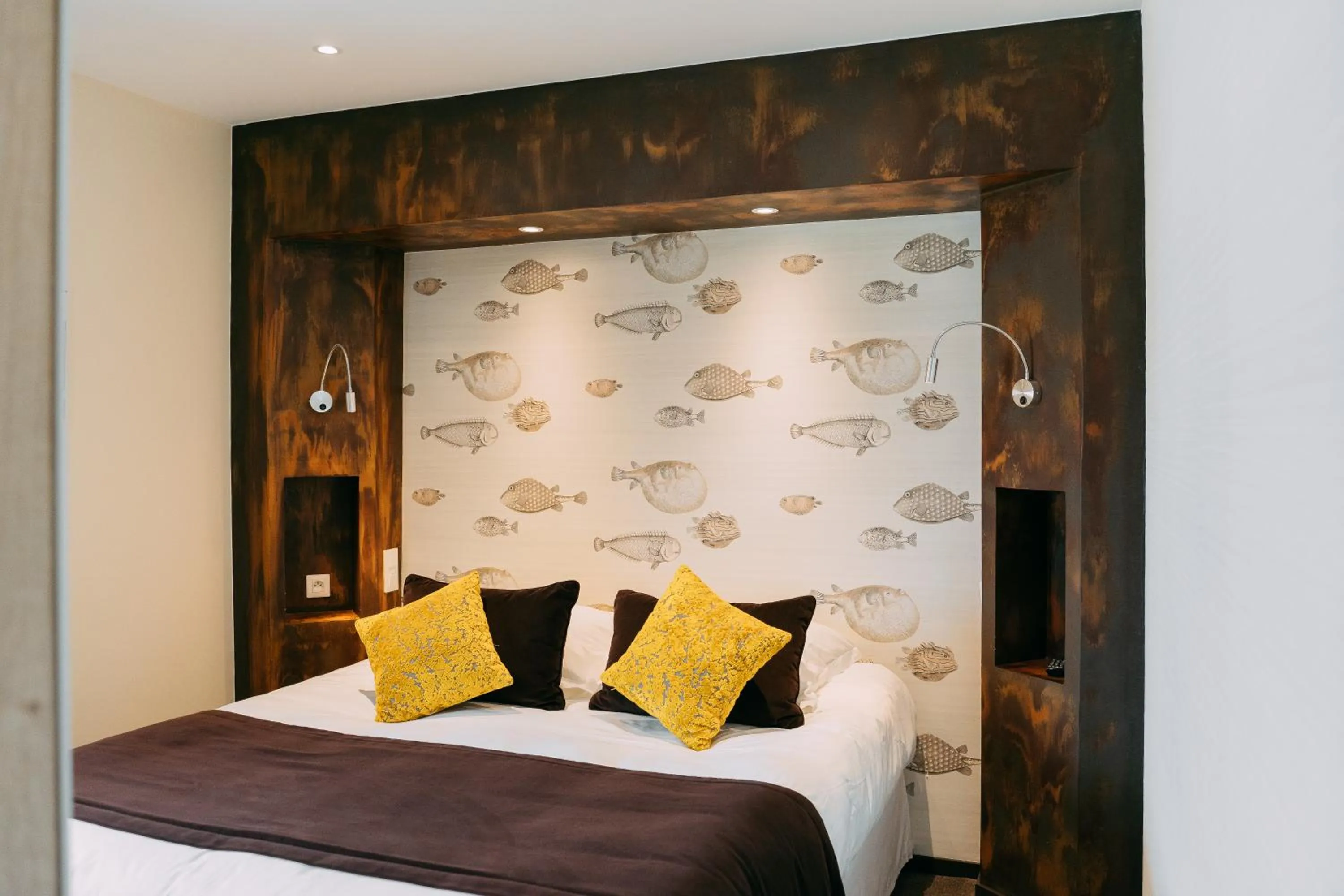 Bed in Hôtel Les Agapanthes-Logis Hôtel