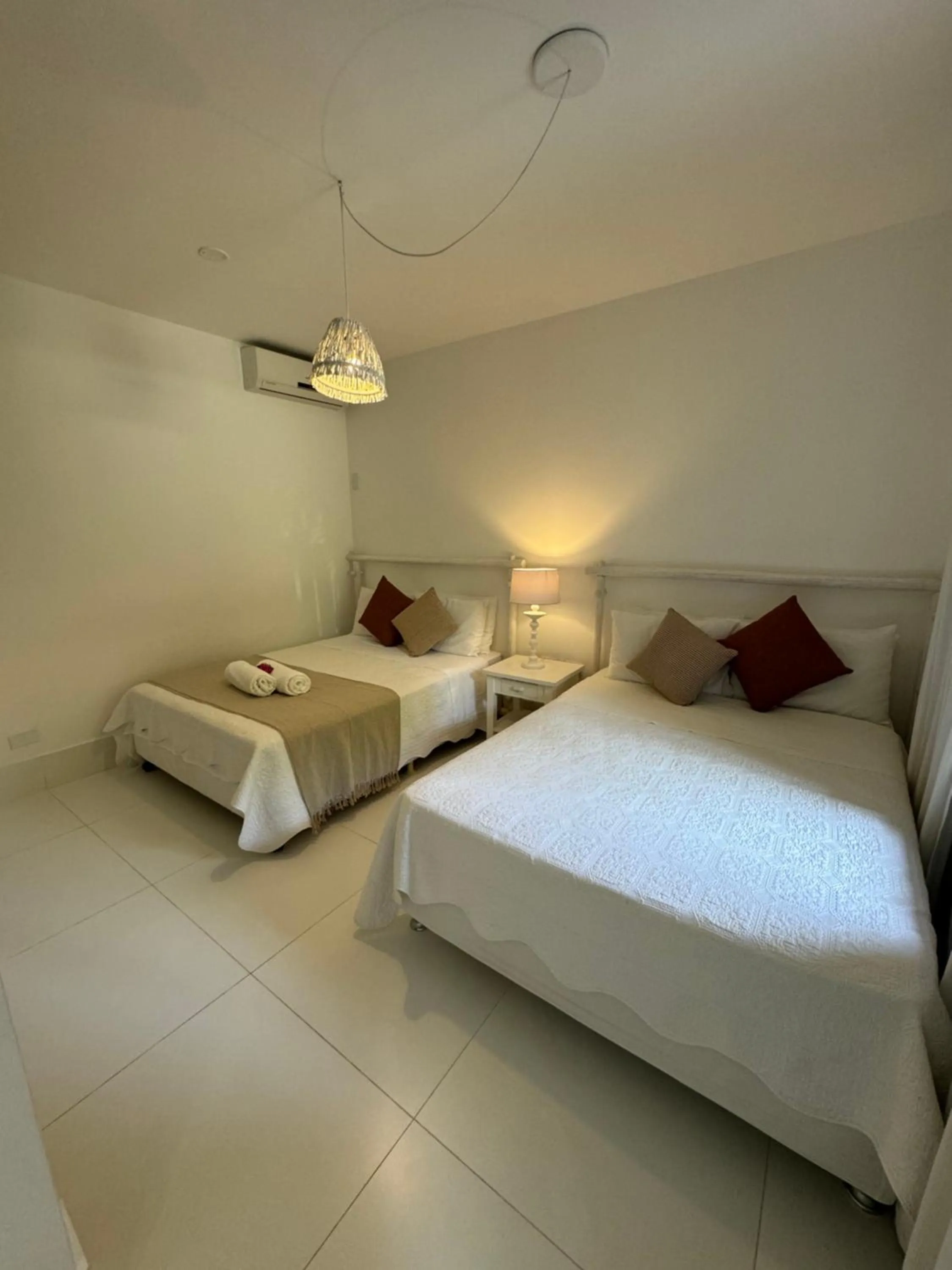 Bed in Pousada Coisa e Tao