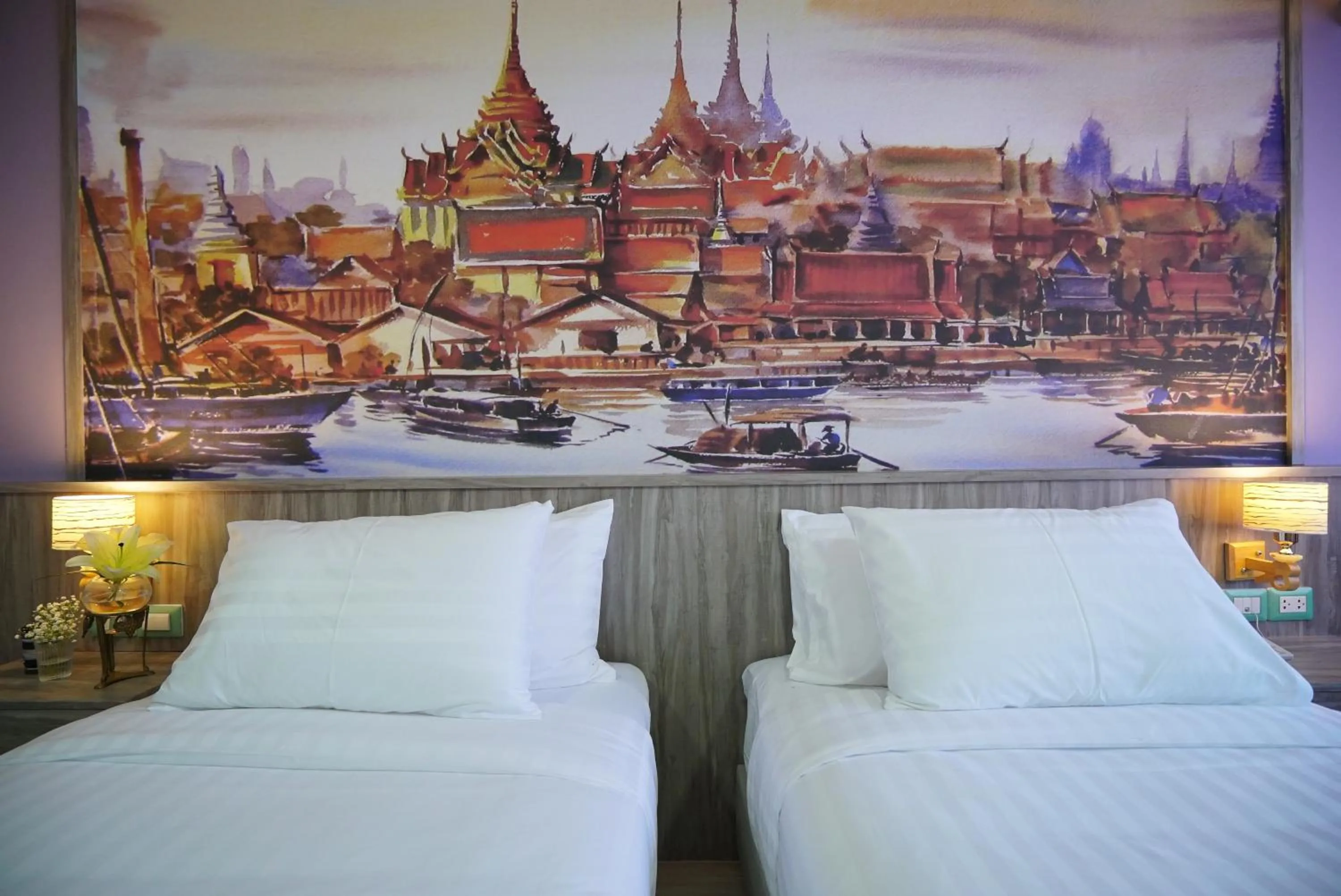 Bed in The Qube fifty Hotel