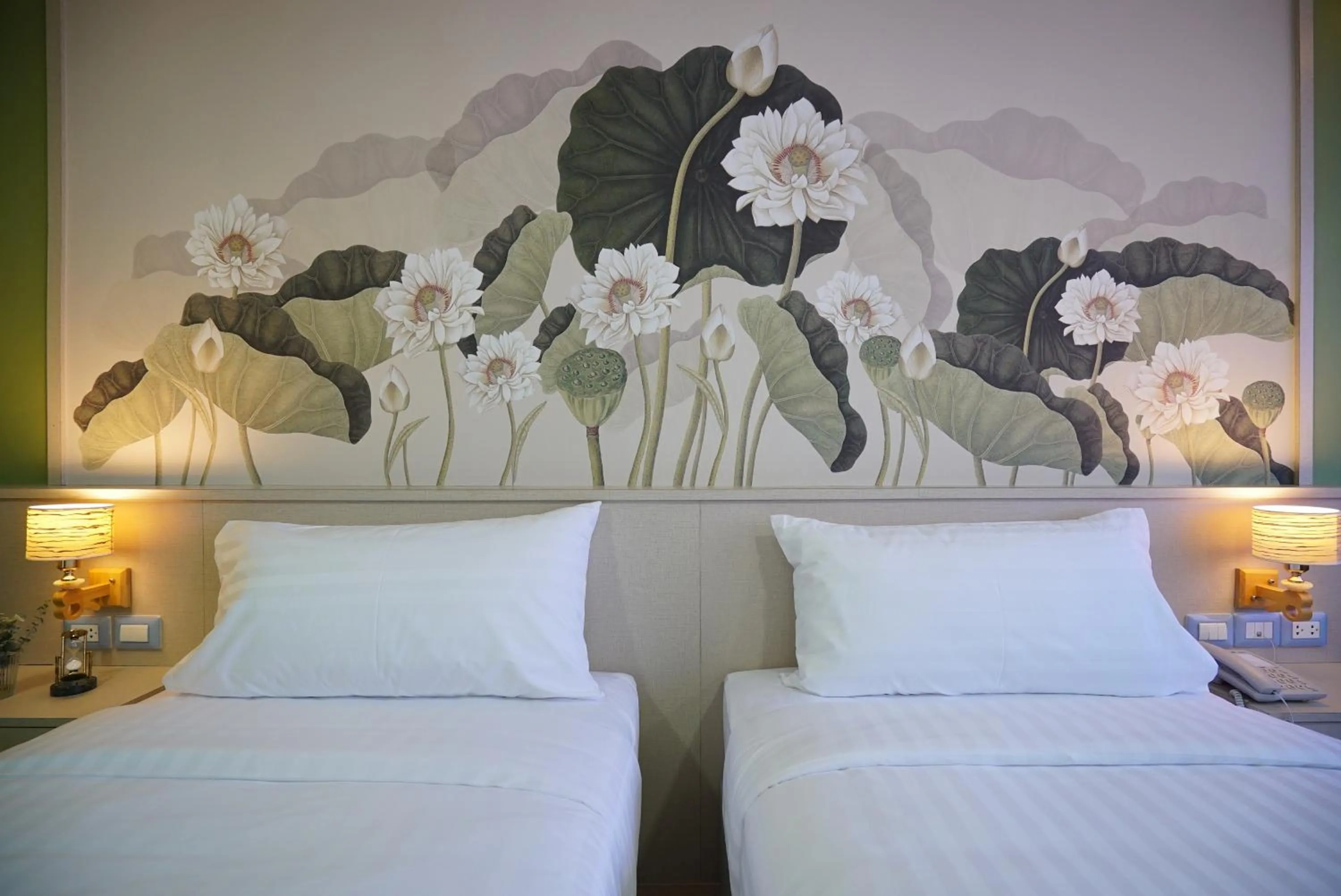 Bed in The Qube fifty Hotel