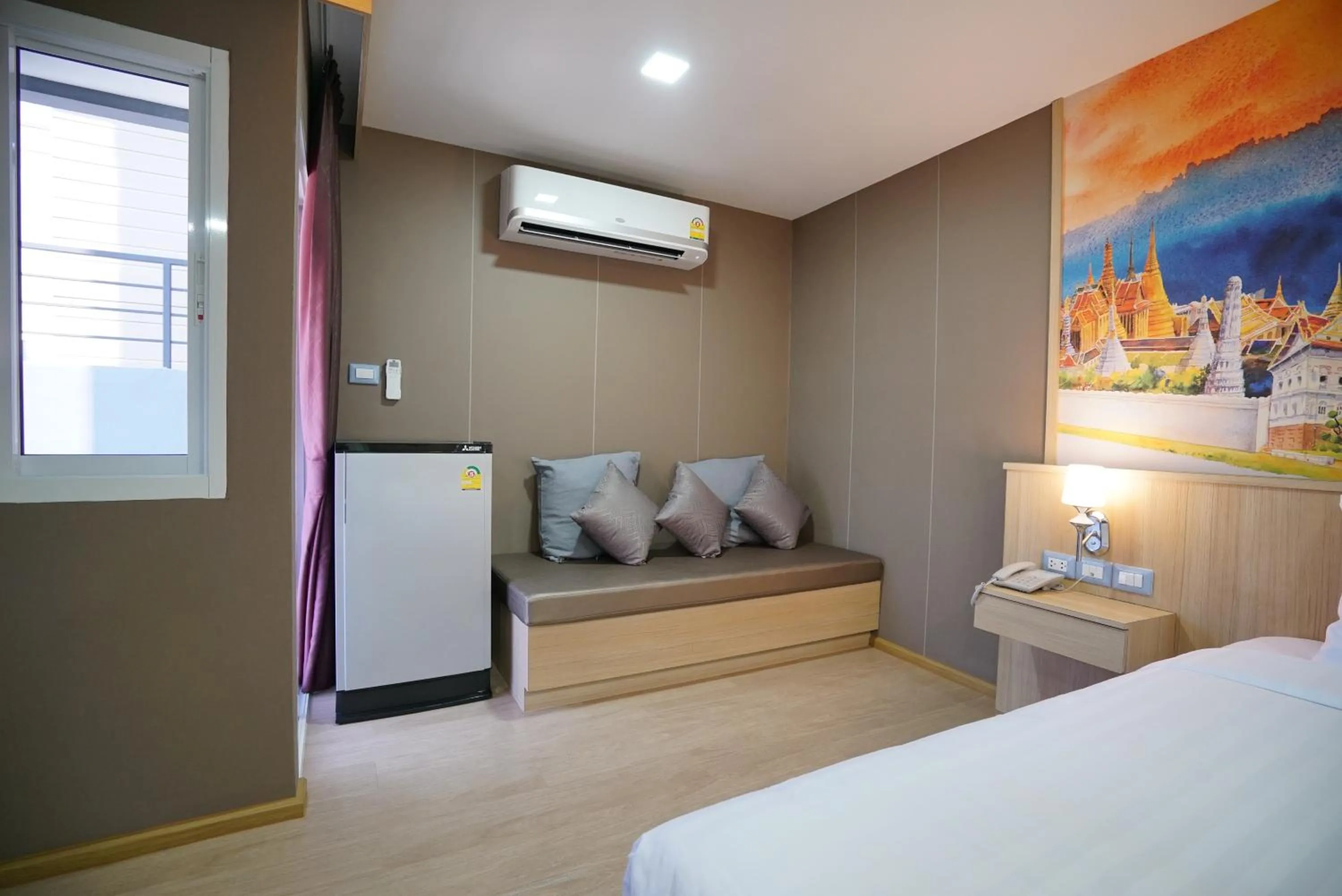 Seating area, Bed in The Qube fifty Hotel