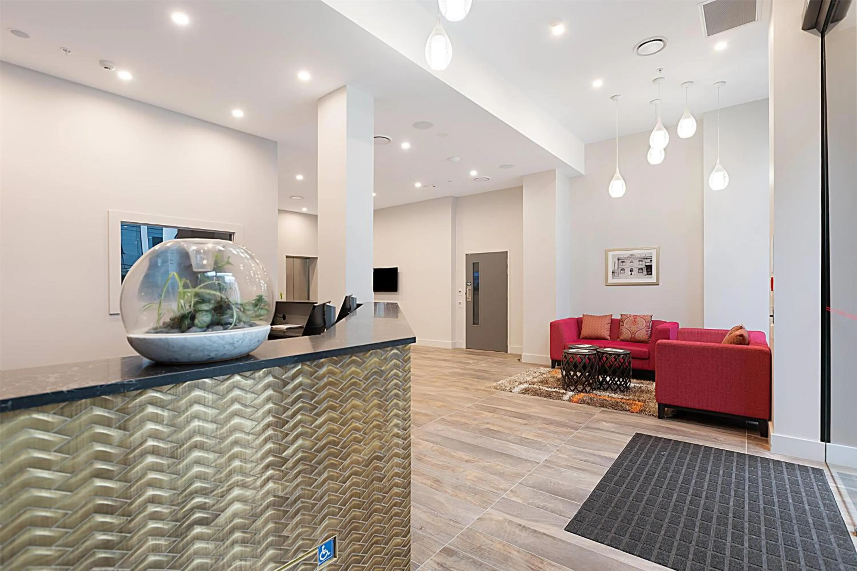 Lobby or reception in Ramada Suites By Wyndham Victoria Street West