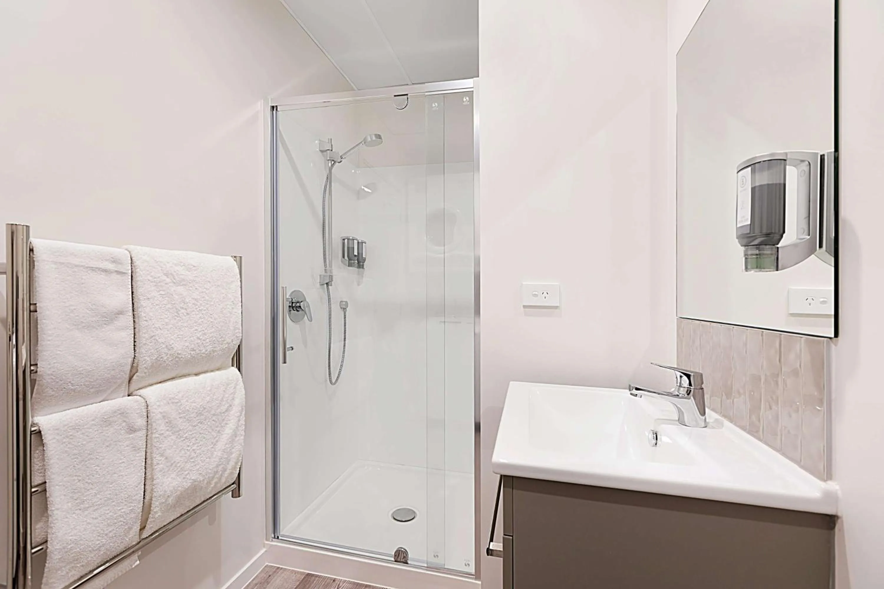 Bathroom in Ramada Suites By Wyndham Victoria Street West