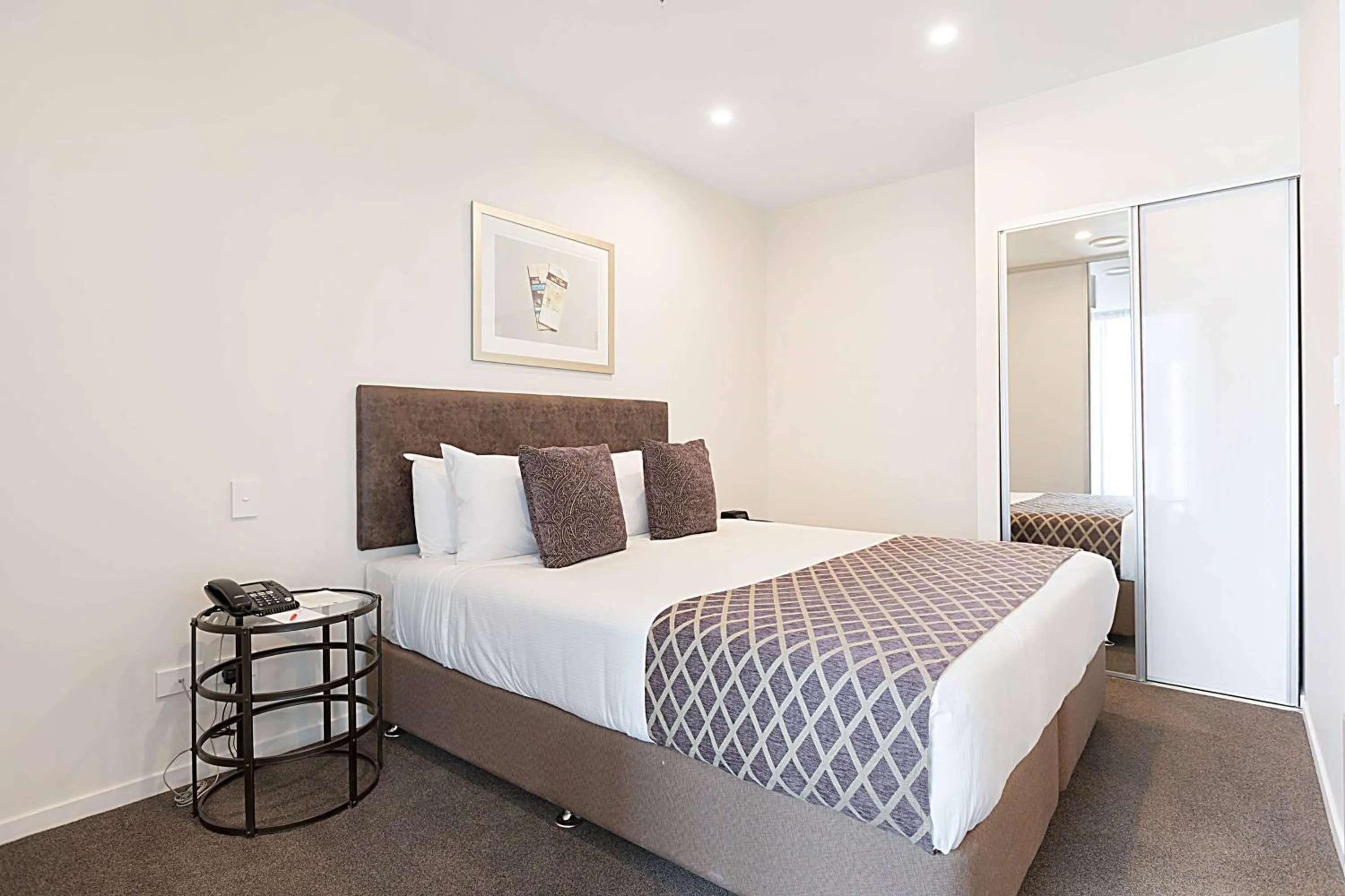 Photo of the whole room, Bed in Ramada Suites By Wyndham Victoria Street West