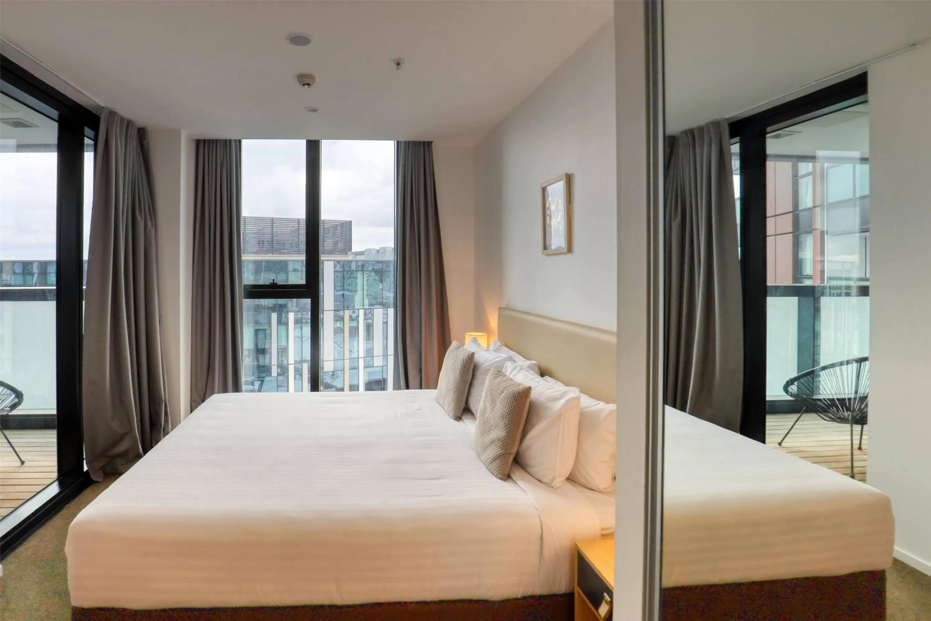 Photo of the whole room, Bed in Ramada Suites By Wyndham Victoria Street West