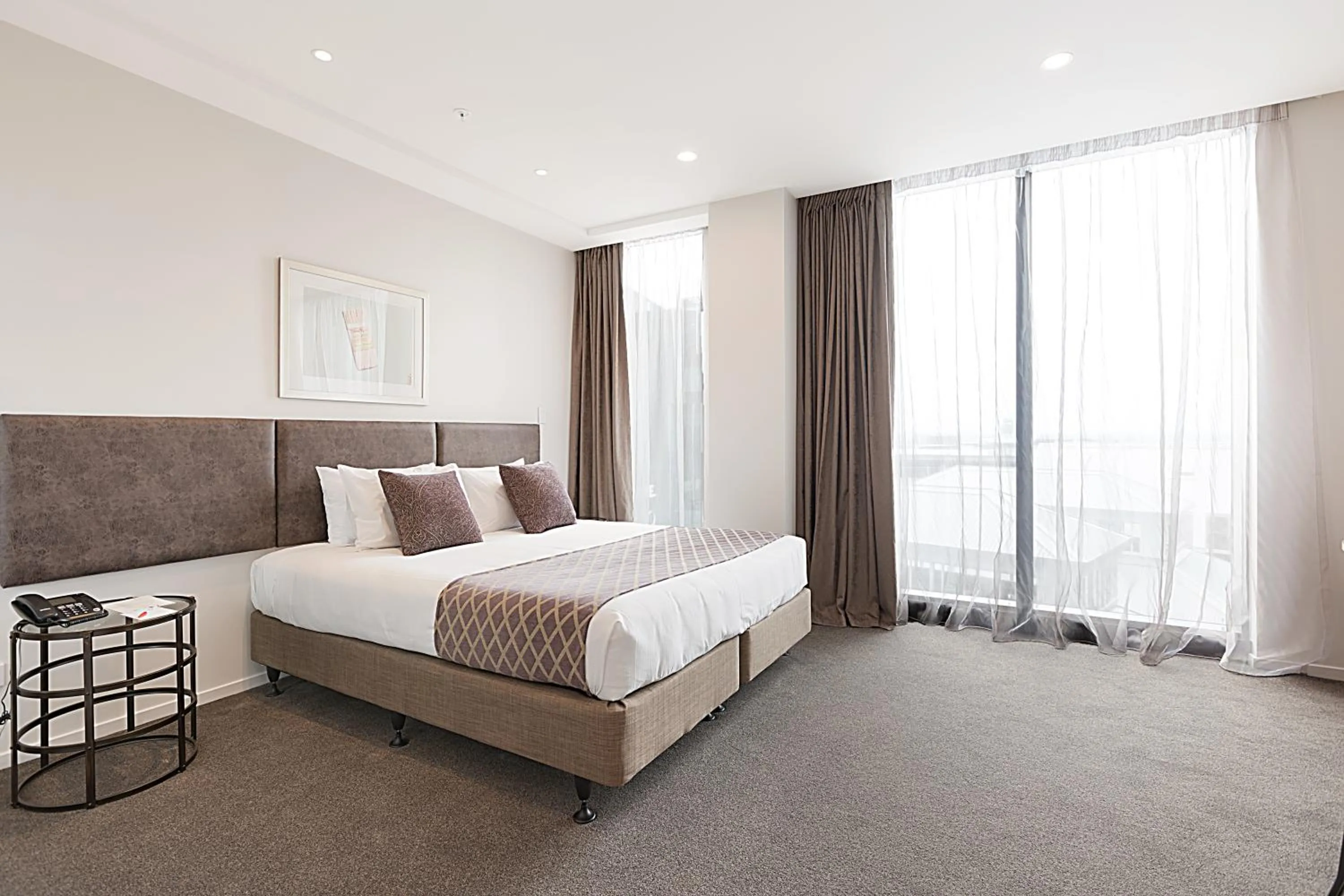 Bedroom, Bed in Ramada Suites By Wyndham Victoria Street West