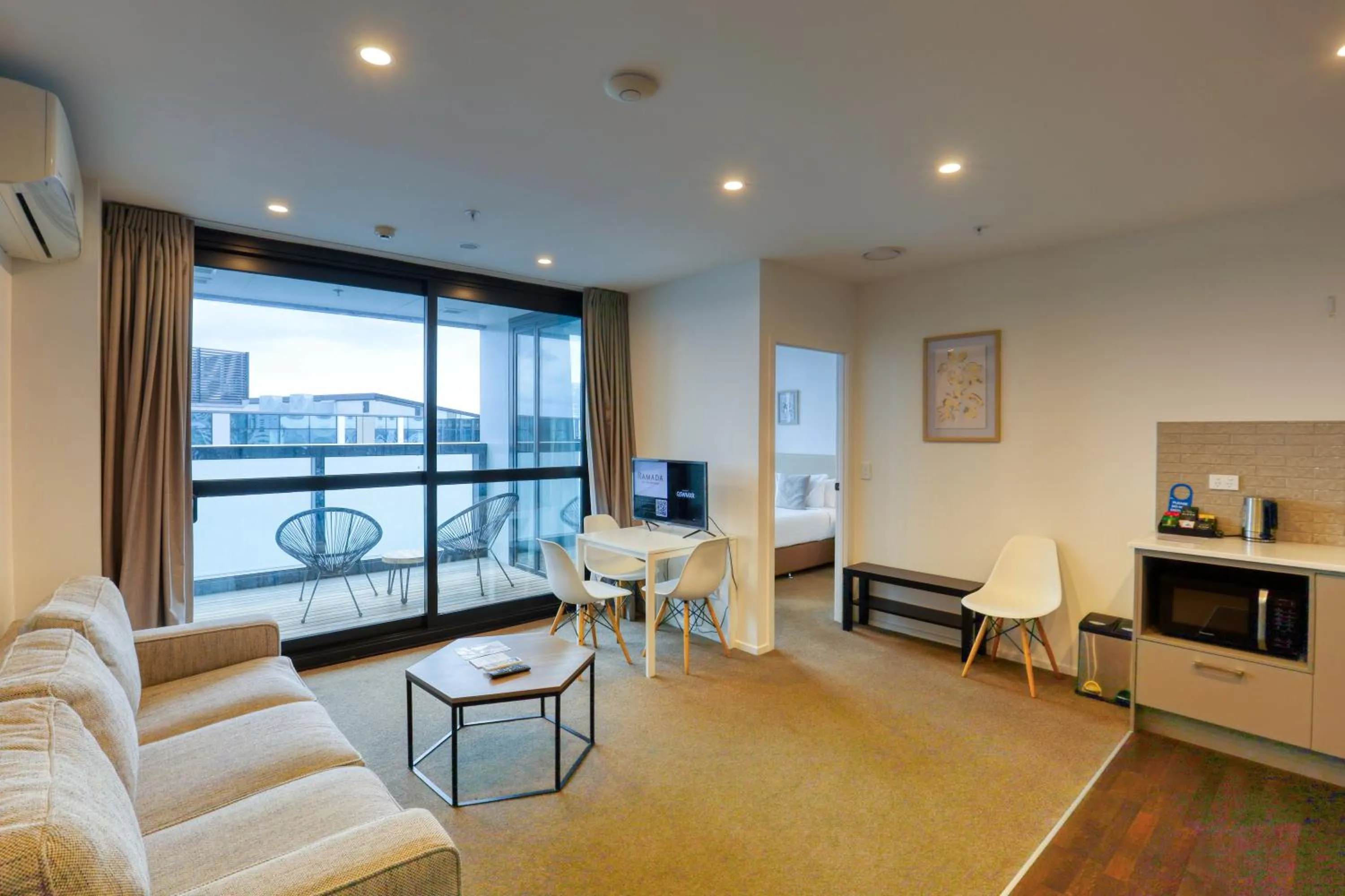 Living room in Ramada Suites By Wyndham Victoria Street West