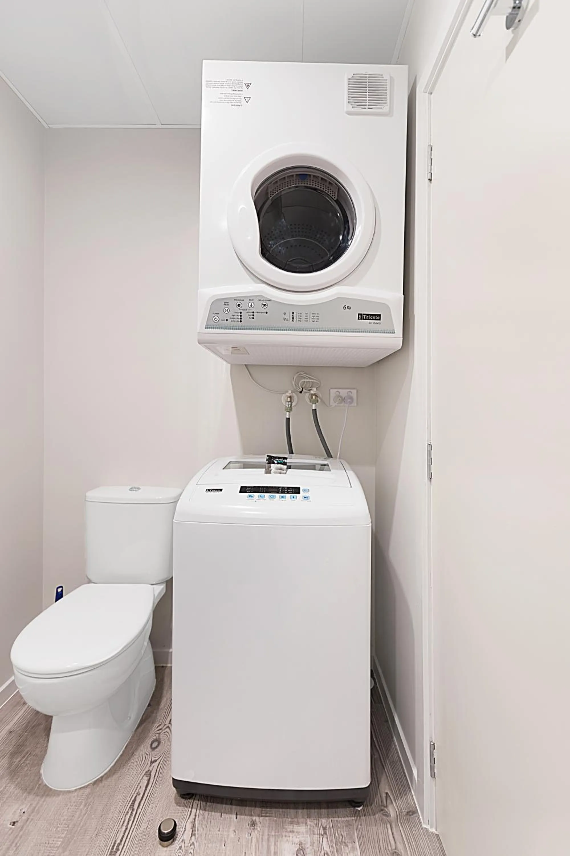 Toilet in Ramada Suites By Wyndham Victoria Street West