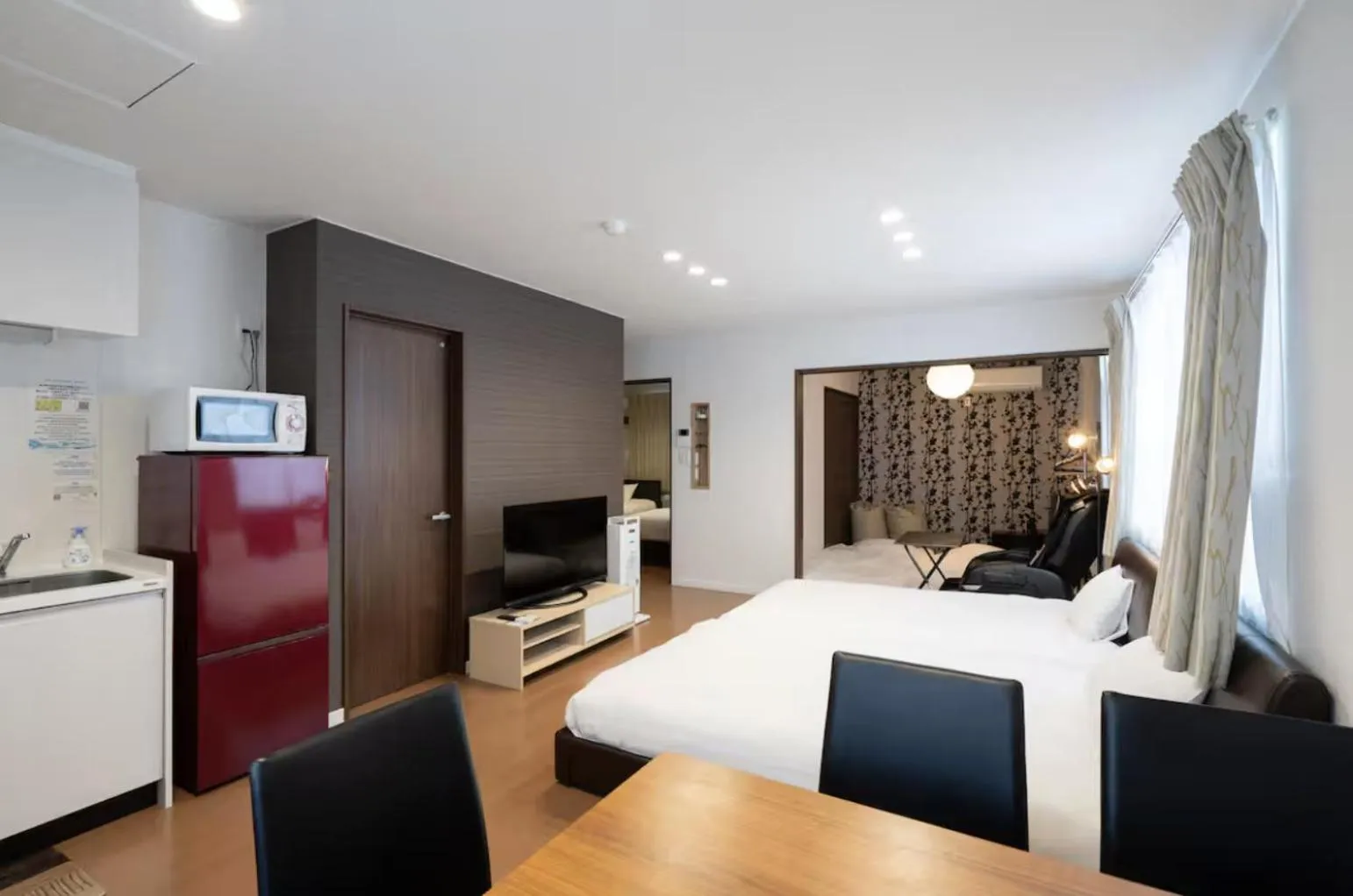 Dining area, Bed in The Peak Villa Suite Hokkaido