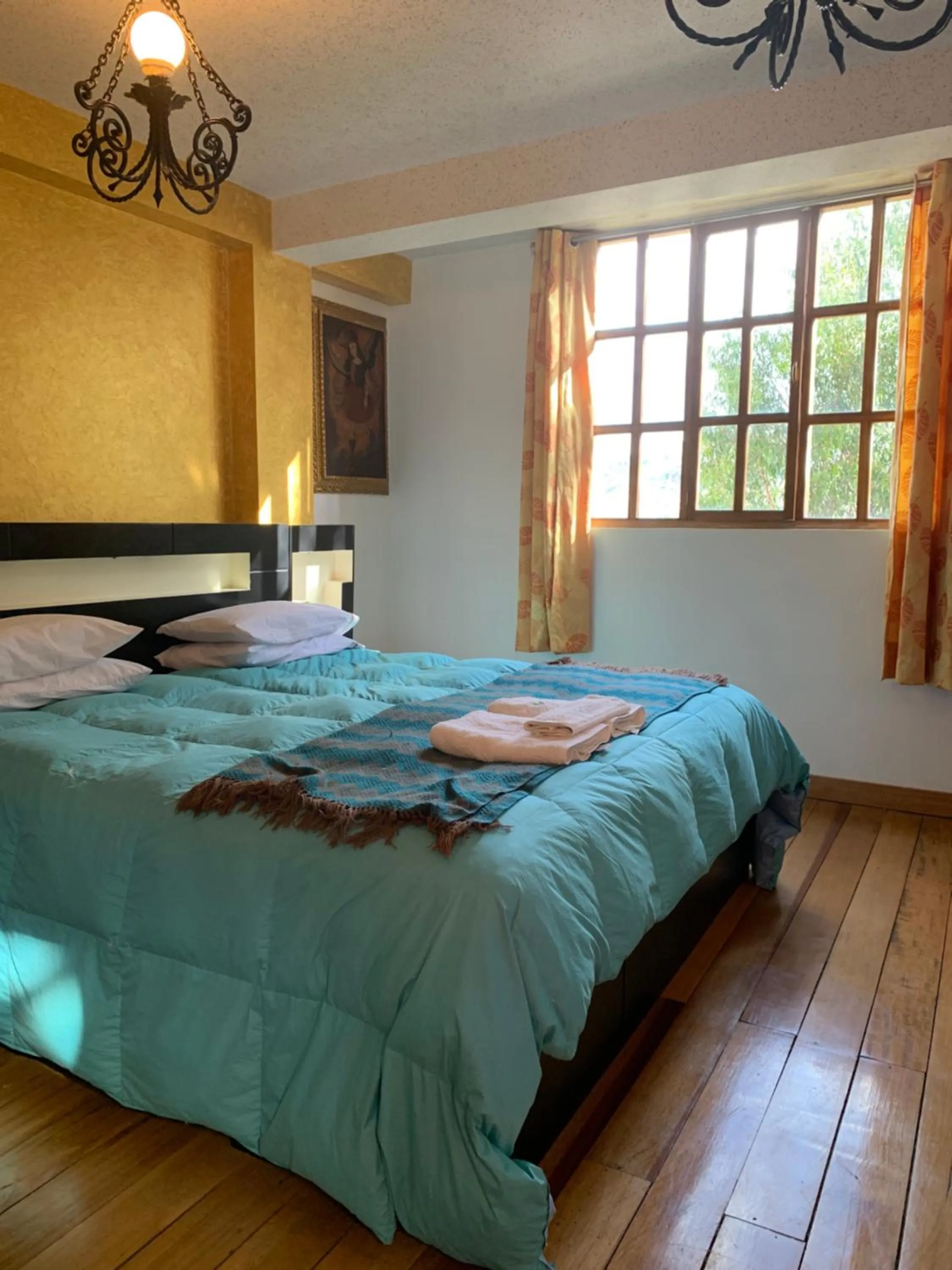 Bed in Hostal Qolqampata