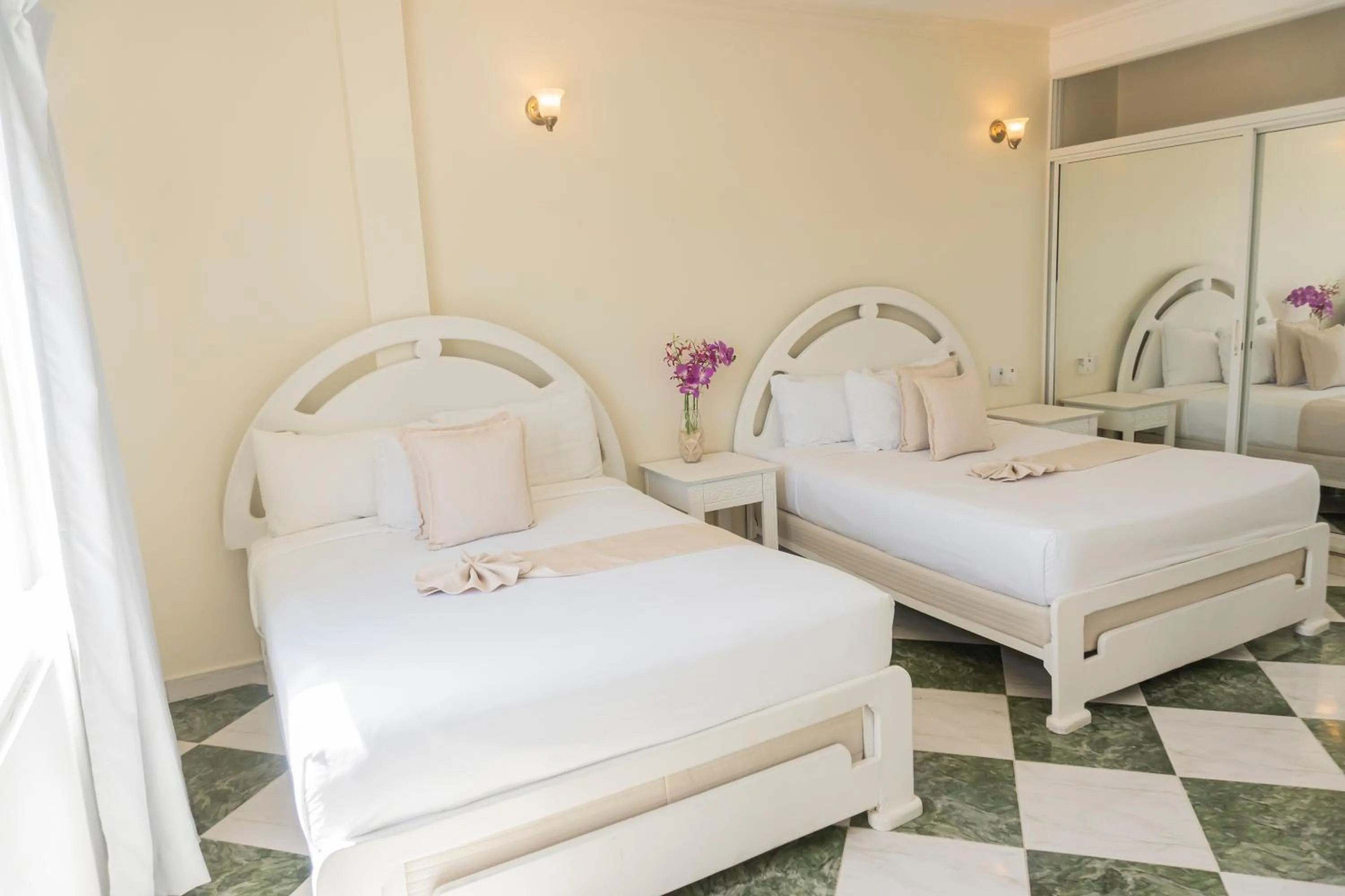 Bed in Green Coast Hotel