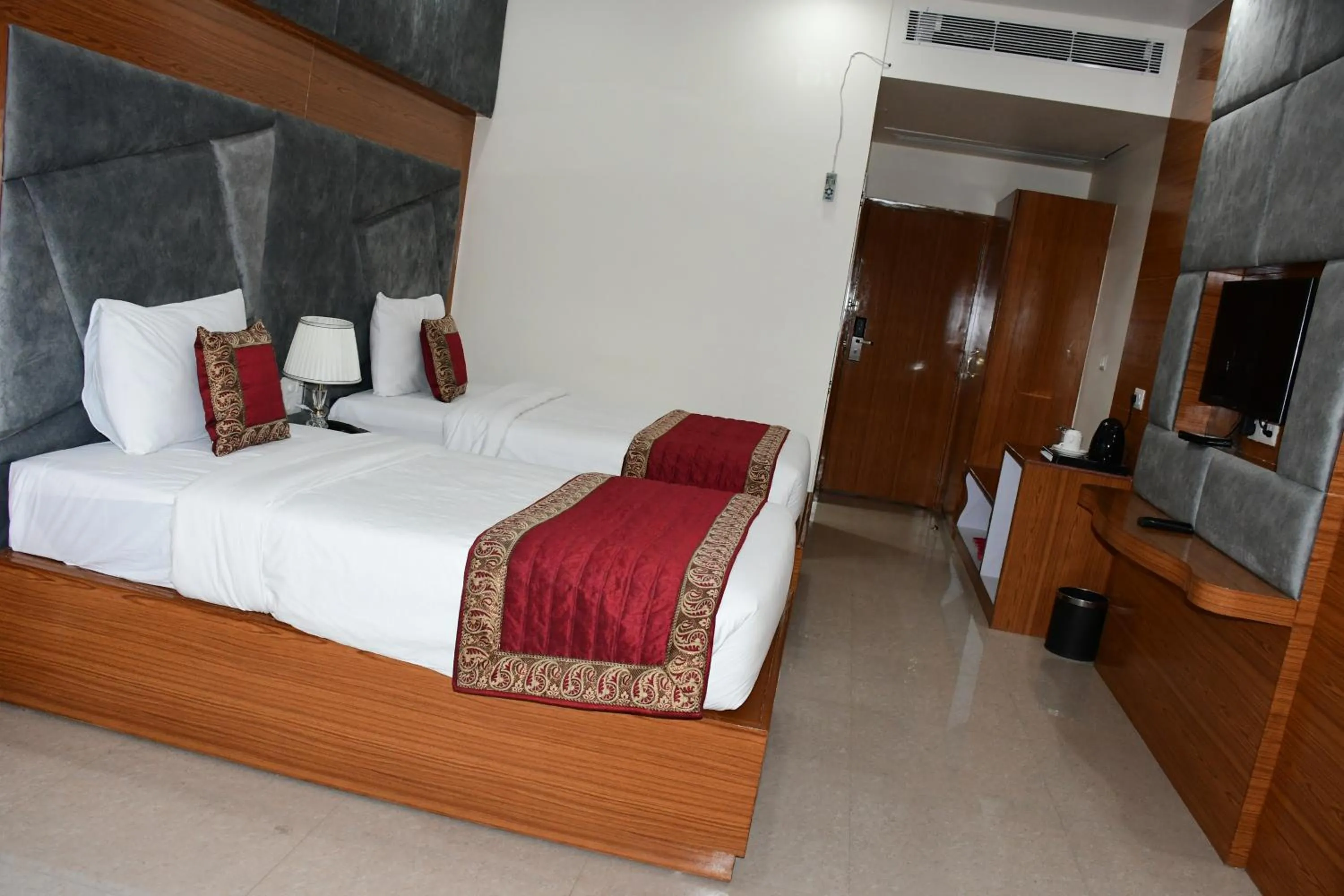 Bed in HOTEL ANAND INTERNATIONAL