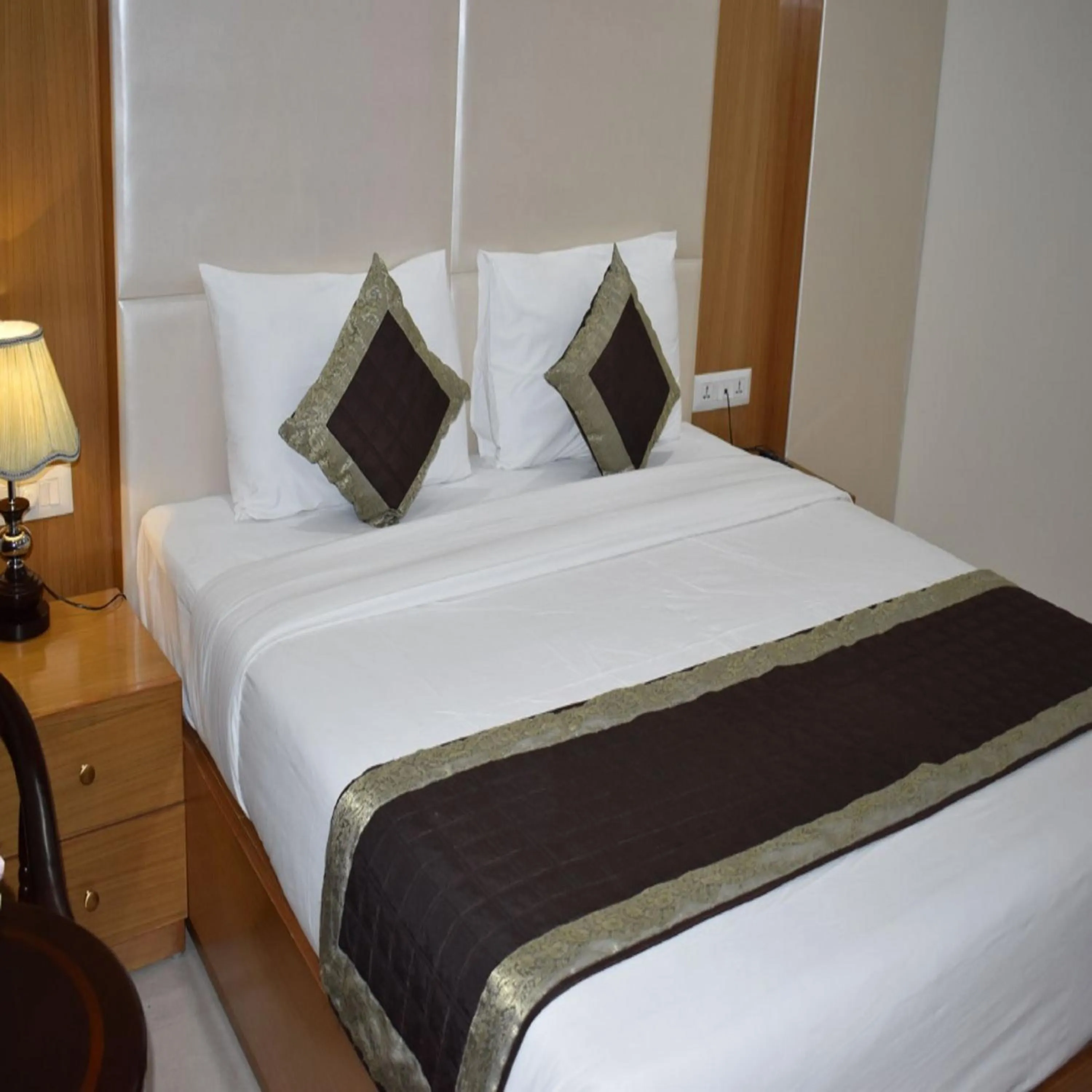 Bed in HOTEL ANAND INTERNATIONAL