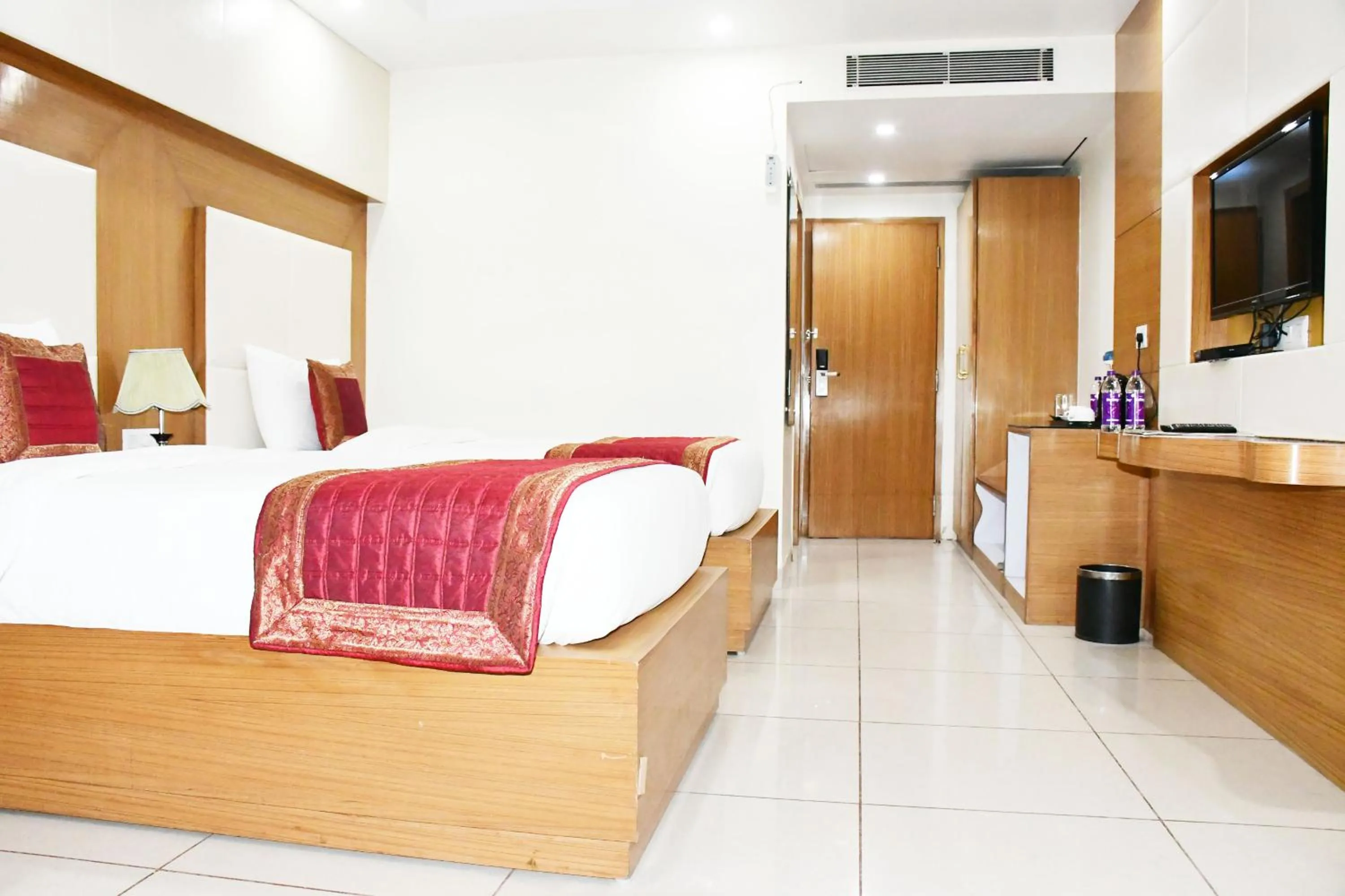 Bed in HOTEL ANAND INTERNATIONAL