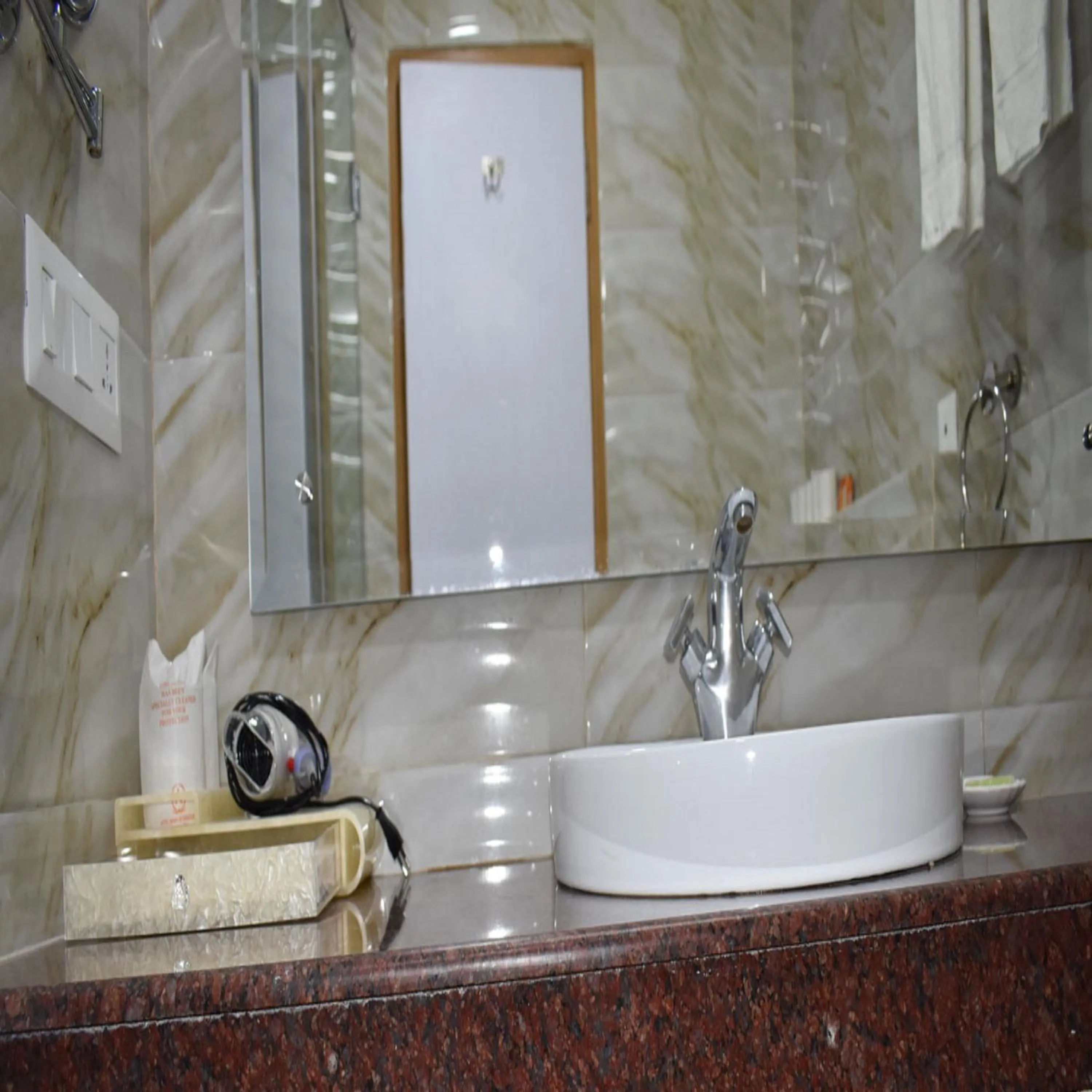 Bathroom in HOTEL ANAND INTERNATIONAL